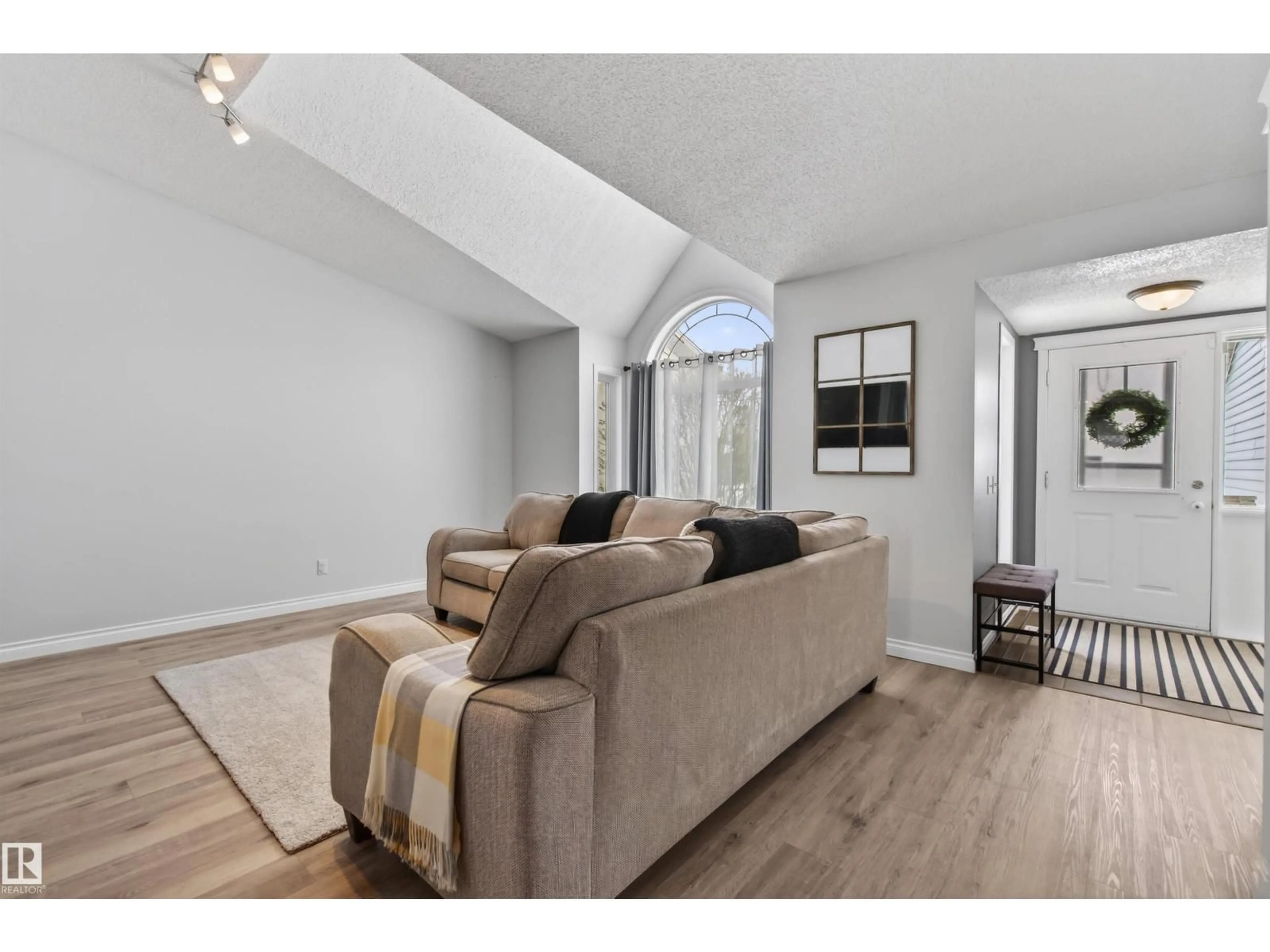 Living room with furniture, unknown for 208 20A ST, Cold Lake Alberta T9M1G3