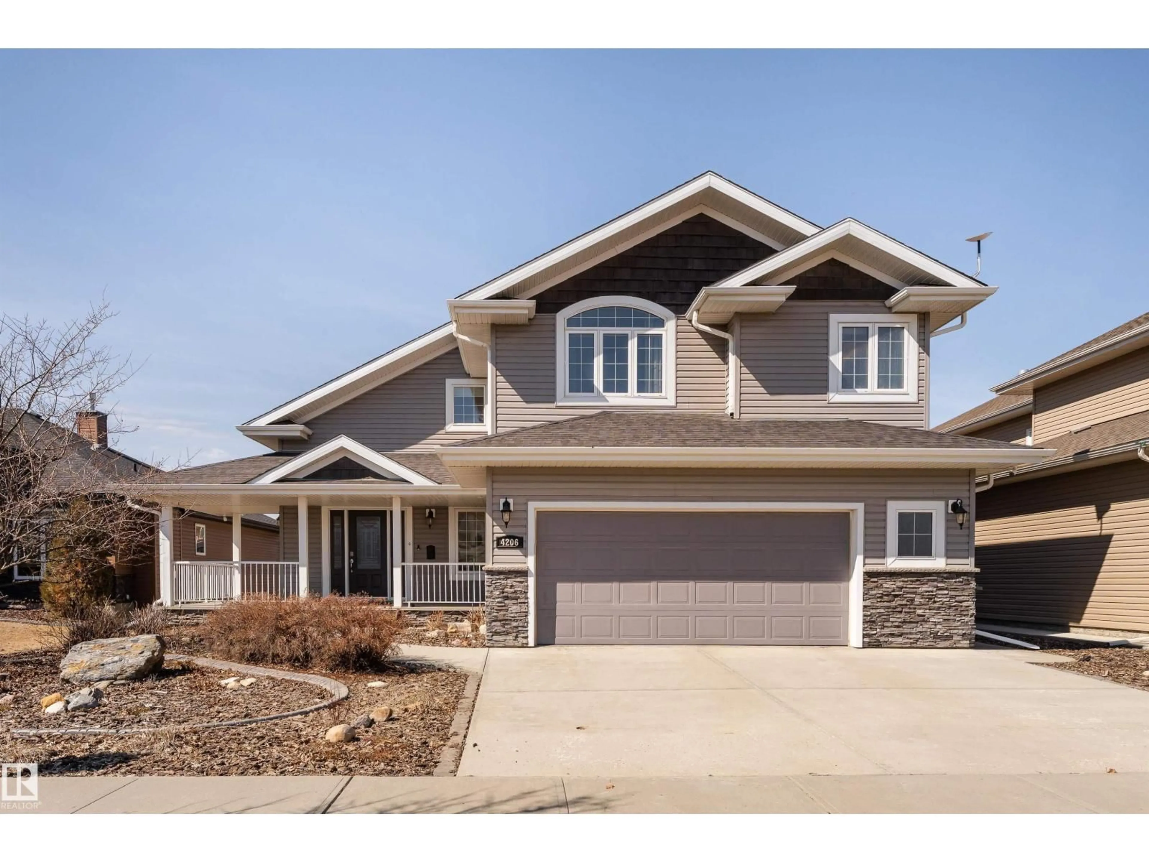 Home with vinyl exterior material, street for 4206 TRIOMPHE PT, Beaumont Alberta T4X0C4