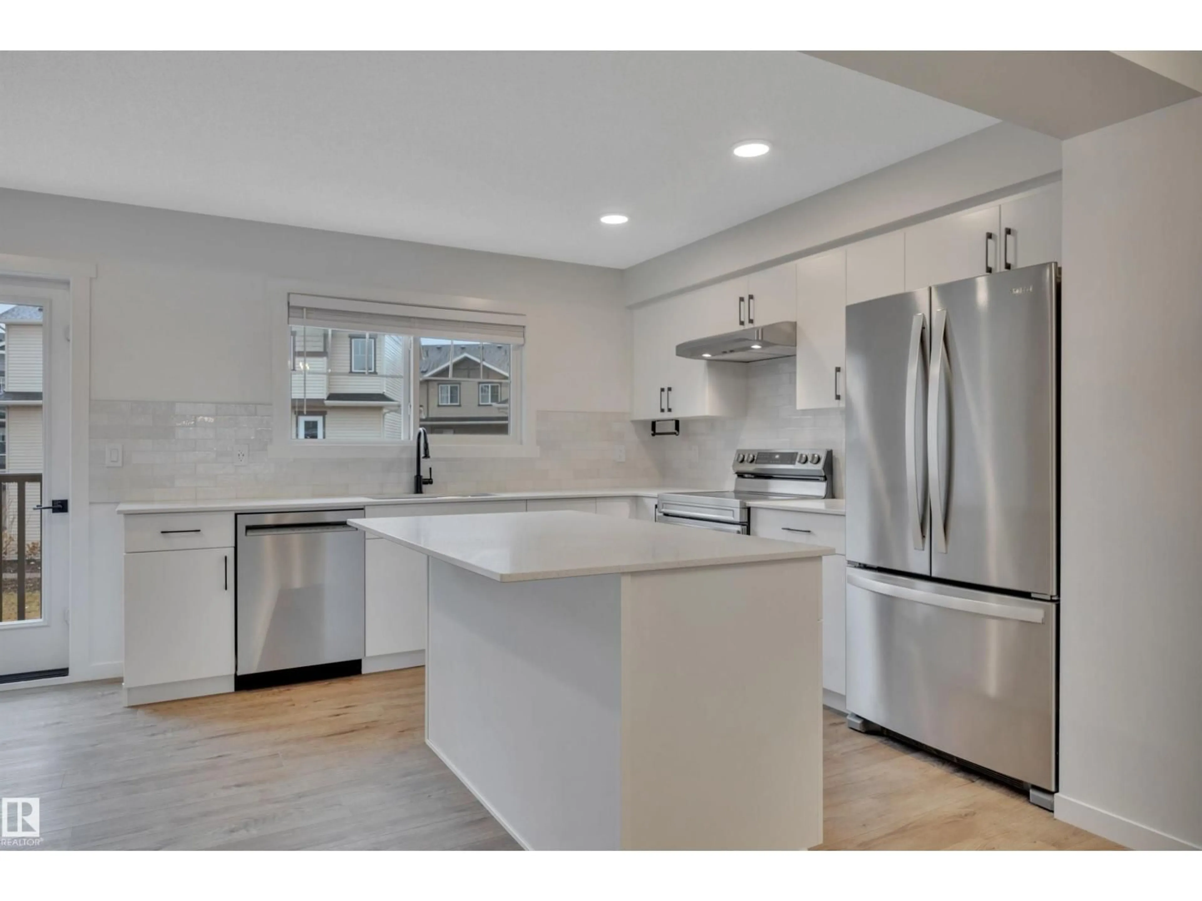 Open concept kitchen, ceramic/tile floor for 79 MCLAUGHLIN DR, Spruce Grove Alberta T7X0K3