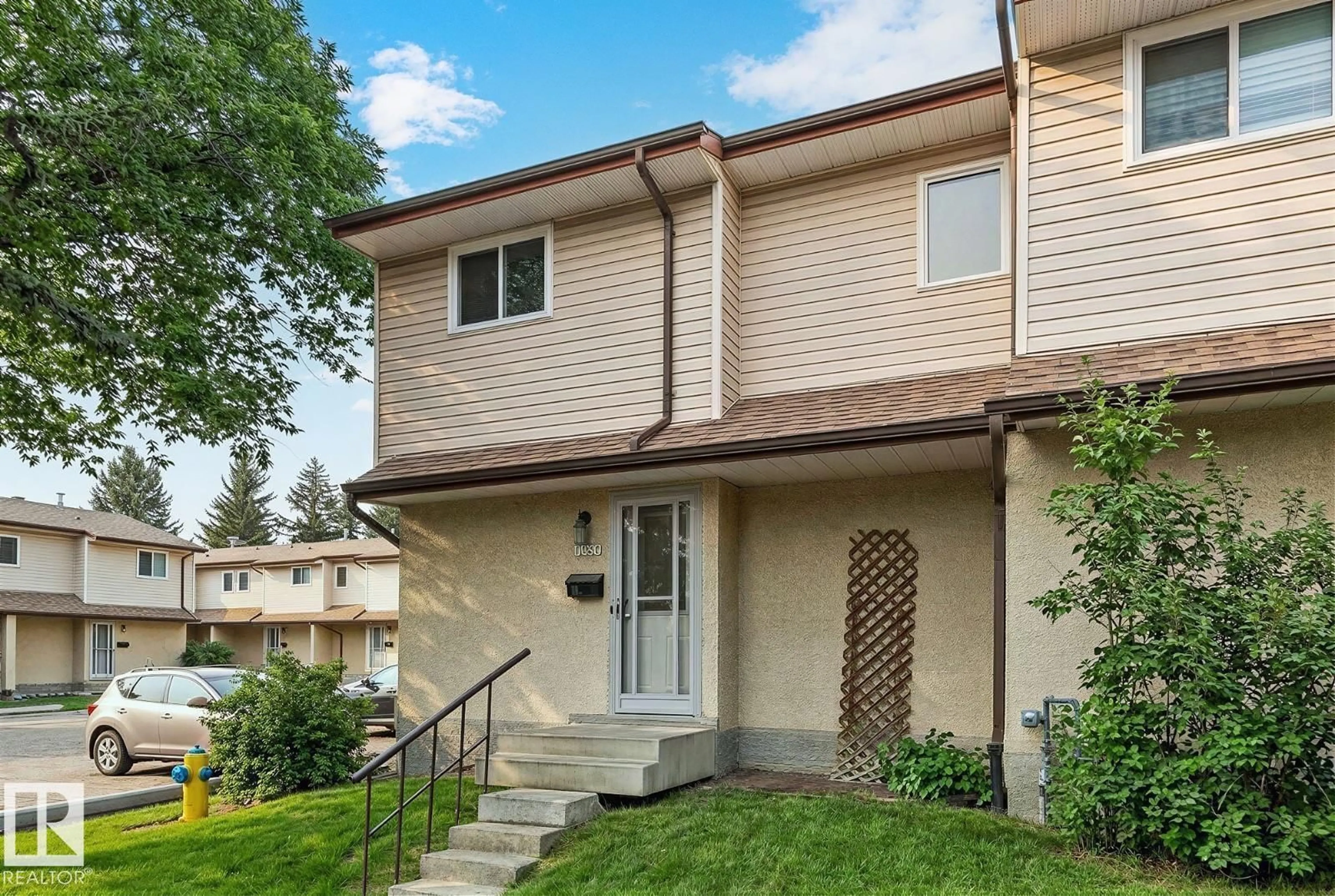 Home with vinyl exterior material, street for 1767 LAKEWOOD RD, Edmonton Alberta T6K3B8