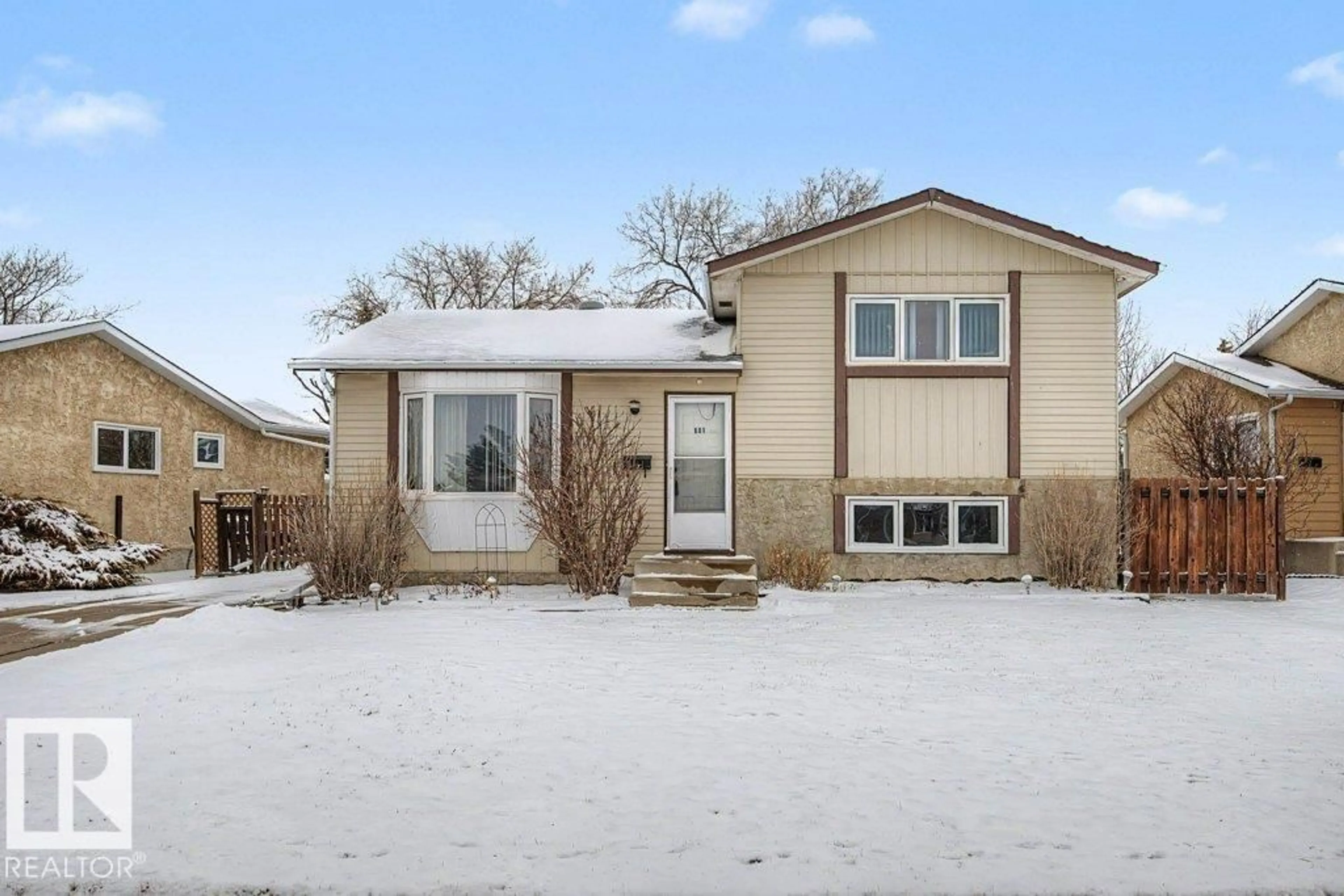 Home with vinyl exterior material, street for 691 WARWICK RD, Edmonton Alberta T5X4R2