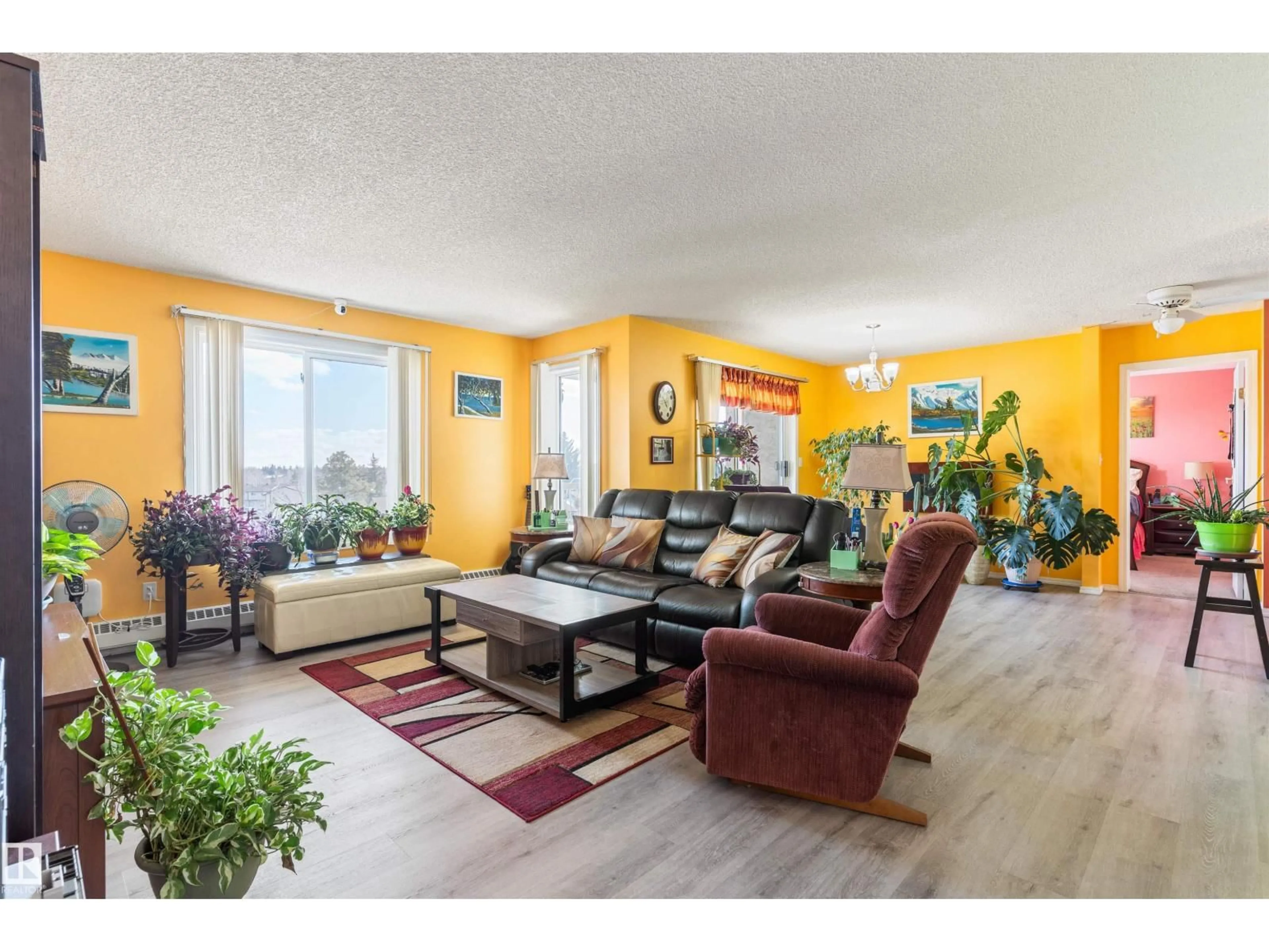 Living room with furniture, wood/laminate floor for #403 - 18020 95 AV NW, Edmonton Alberta T5T6B2