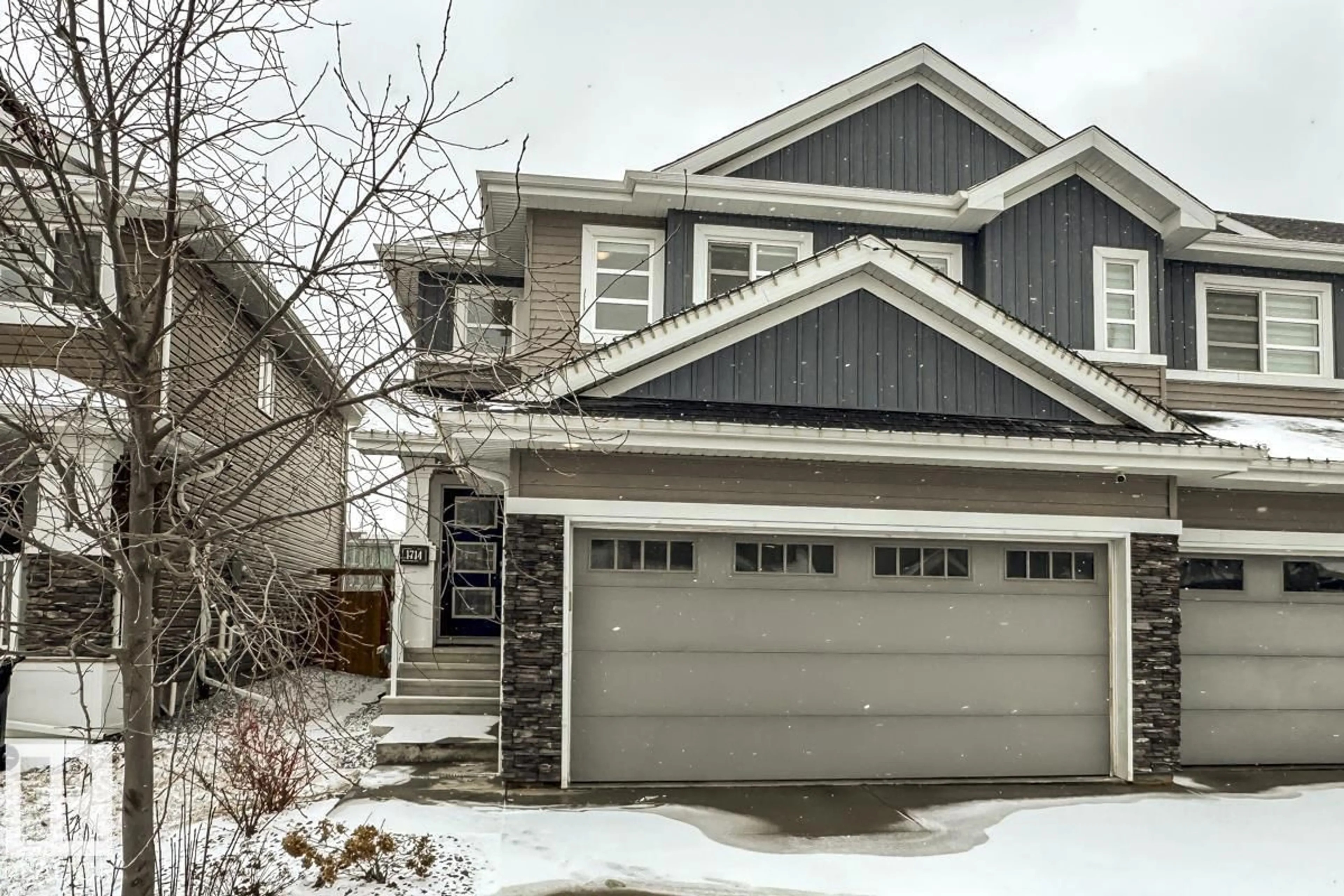 Home with vinyl exterior material, street for SW - 1714 169 ST, Edmonton Alberta T6W3P7
