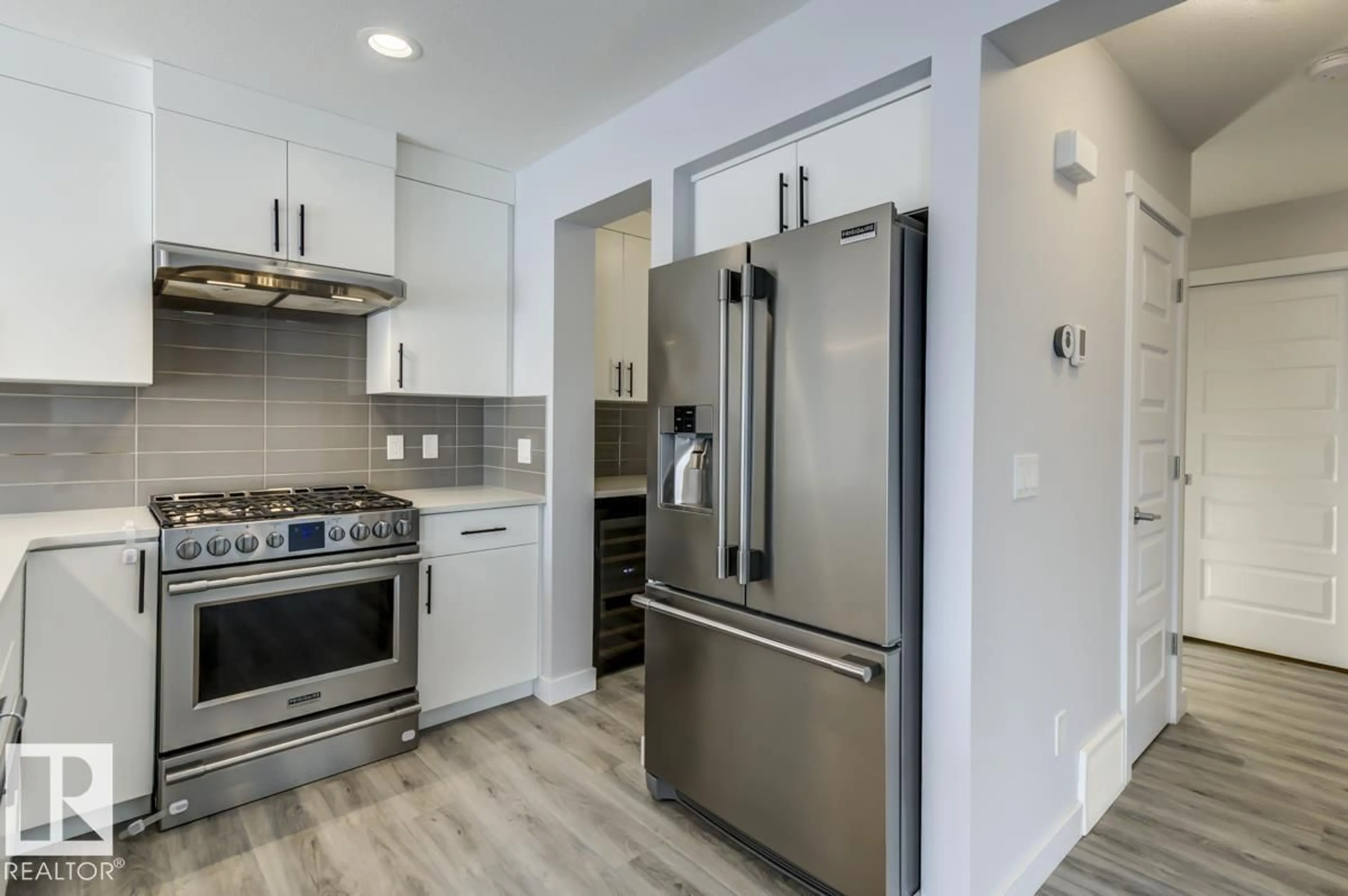 Open concept kitchen, unknown for SW - 1714 169 ST, Edmonton Alberta T6W3P7
