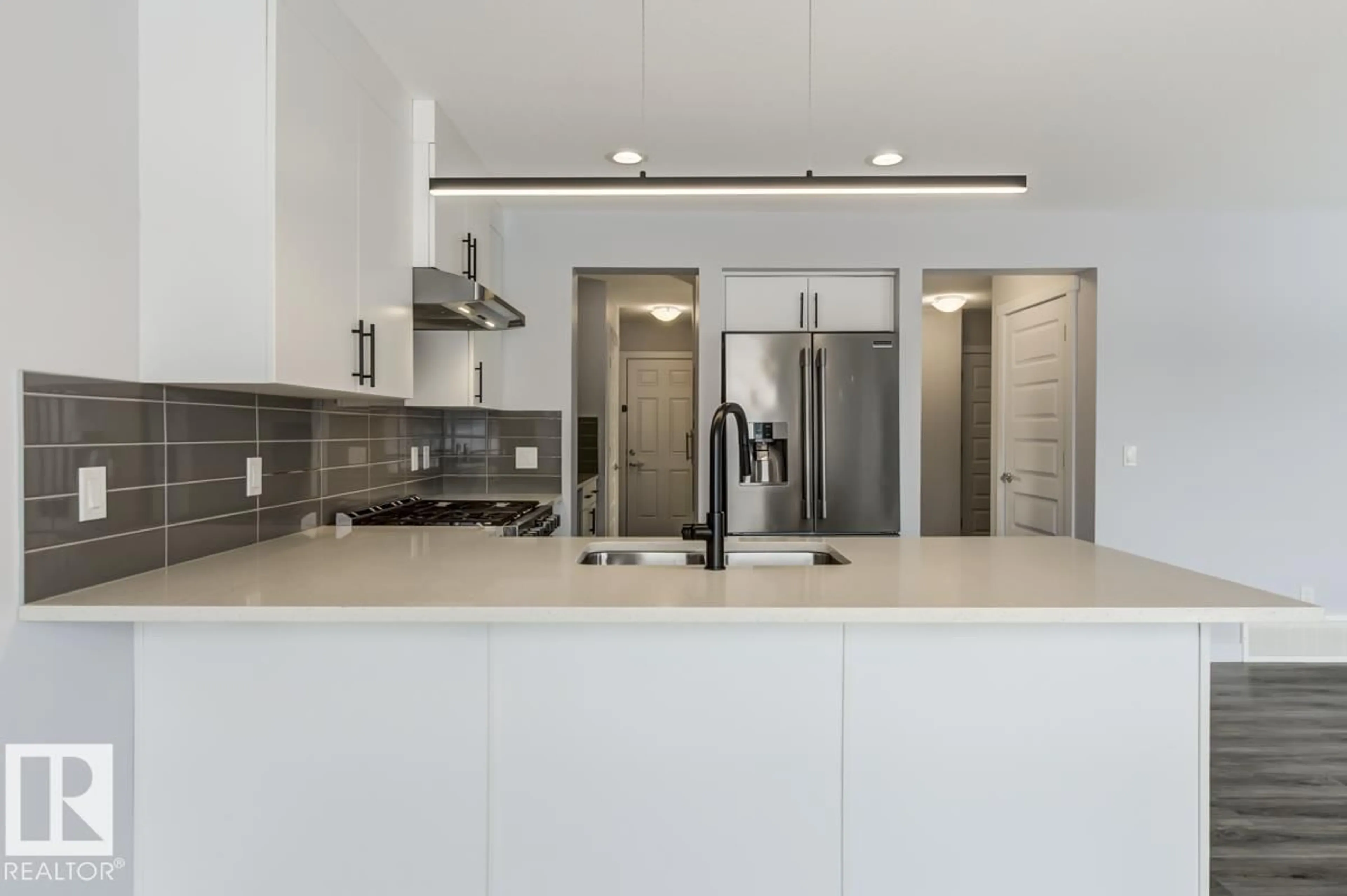 Open concept kitchen, ceramic/tile floor for SW - 1714 169 ST, Edmonton Alberta T6W3P7