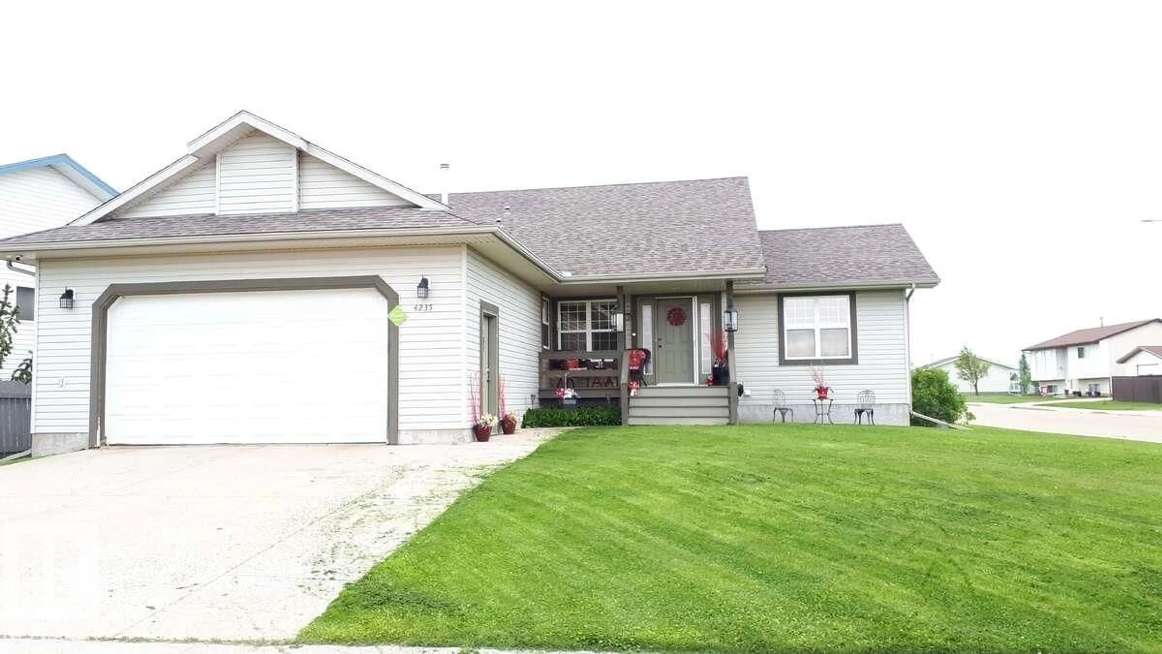Home with vinyl exterior material, street for 4235 55 AV, Tofield Alberta T0B4J0