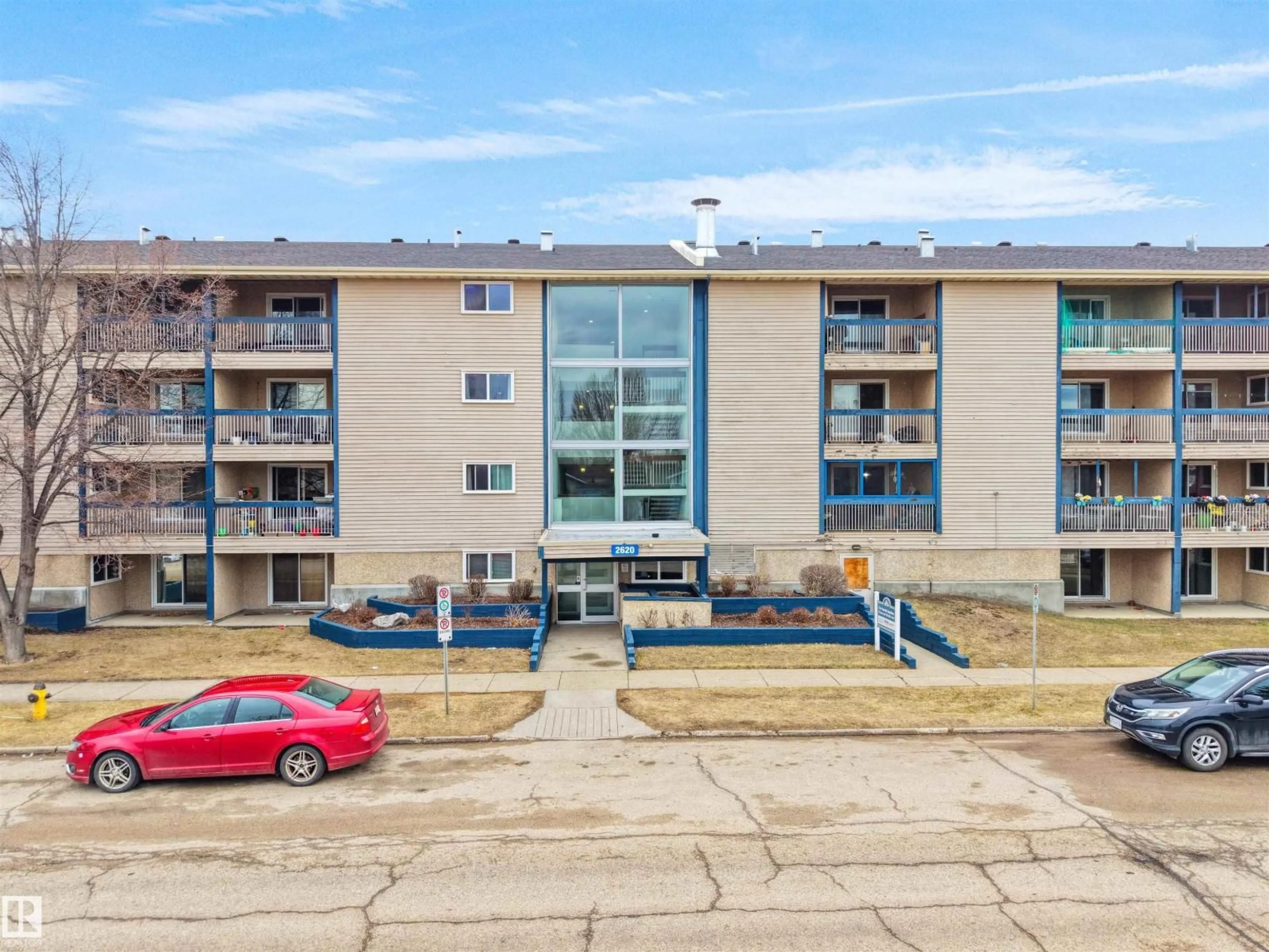 A pic from outside/outdoor area/front of a property/back of a property/a pic from drone, building for #214 - 2620 MILL WOODS RD E, Edmonton Alberta T6L5K6