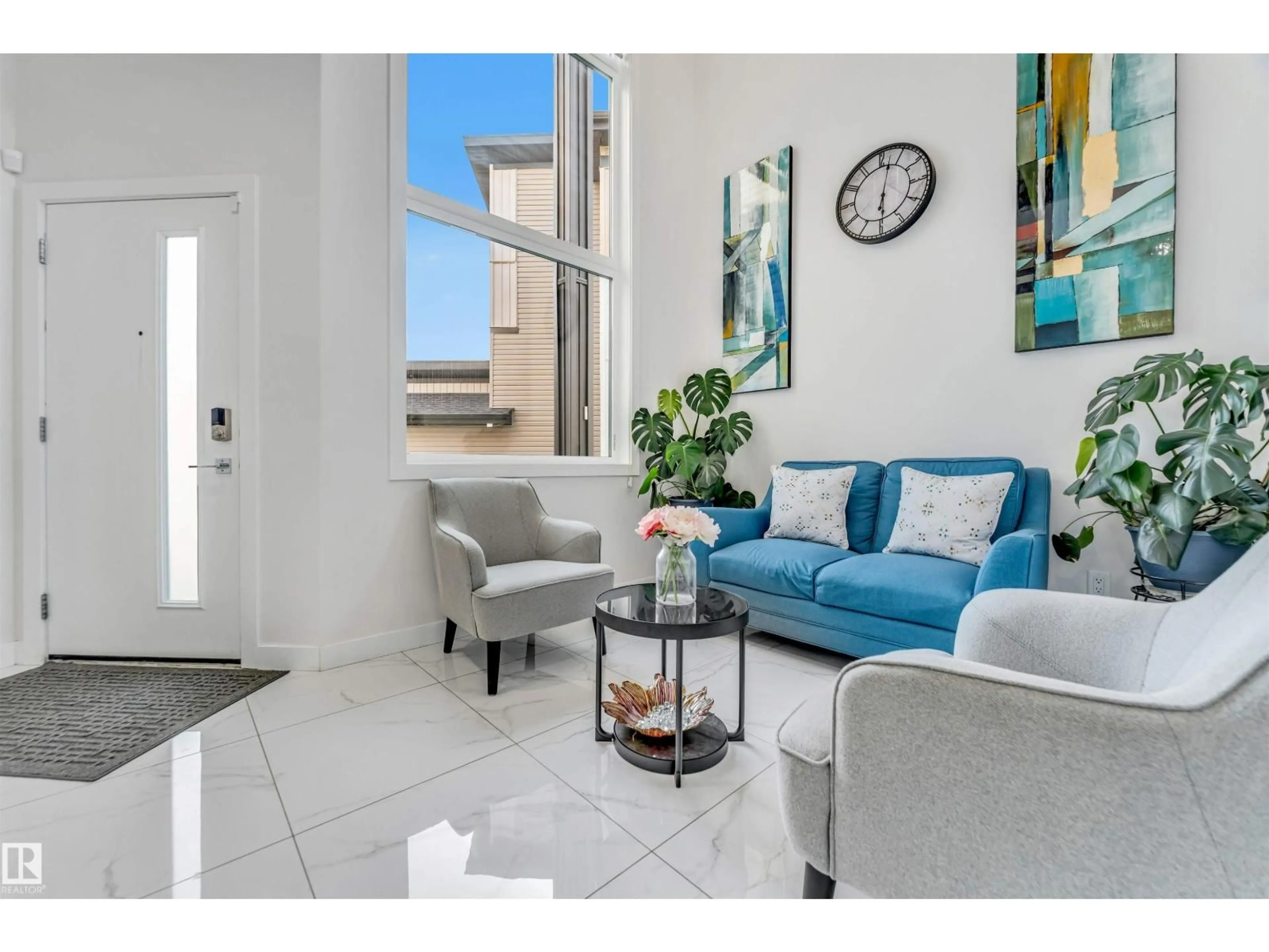 Living room with furniture, ceramic/tile floor for 1522 17 AV, Edmonton Alberta T6T2R9