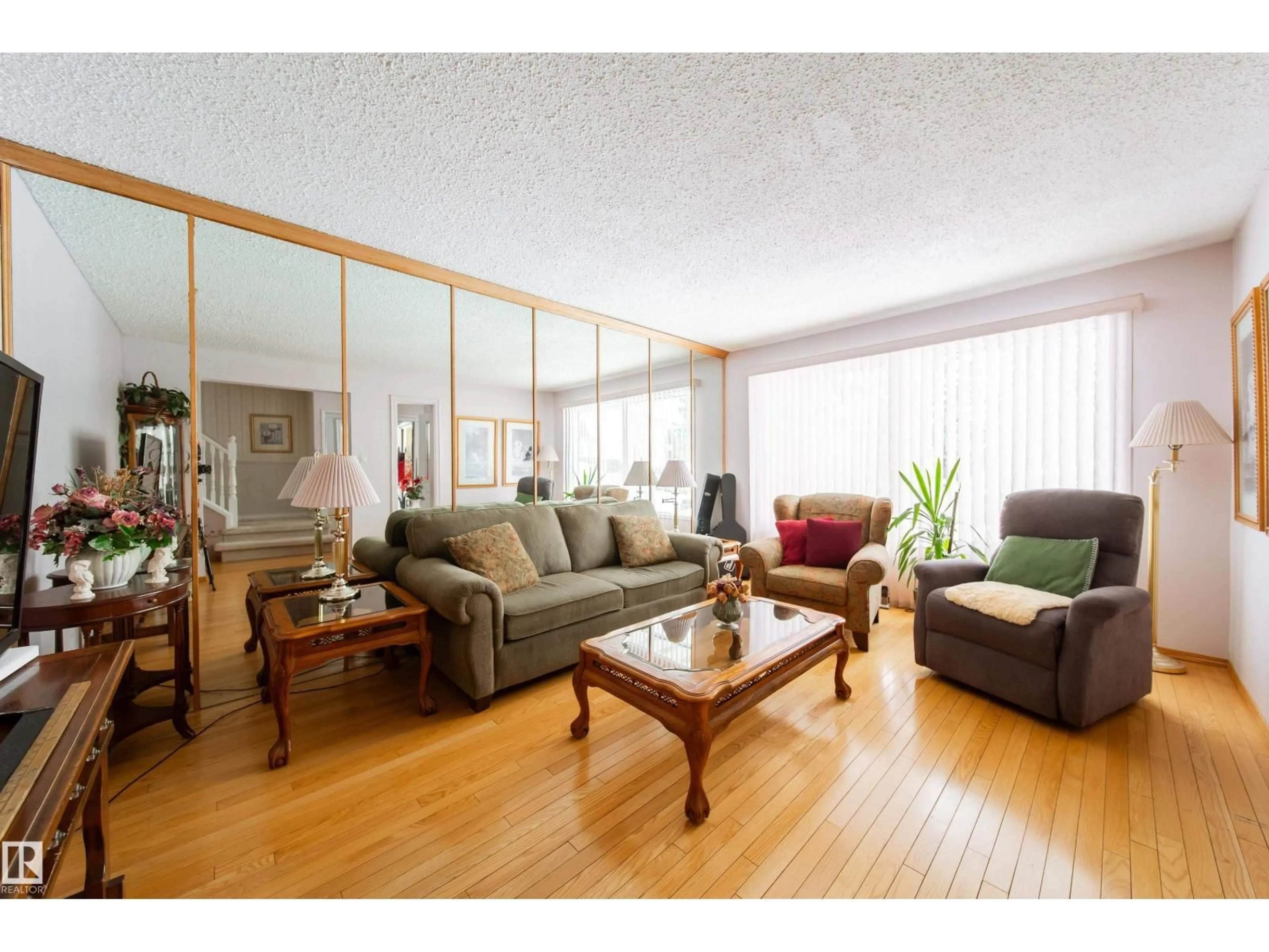 Living room with furniture, wood/laminate floor for 11 GRANADA PL, St. Albert Alberta T8N3C3