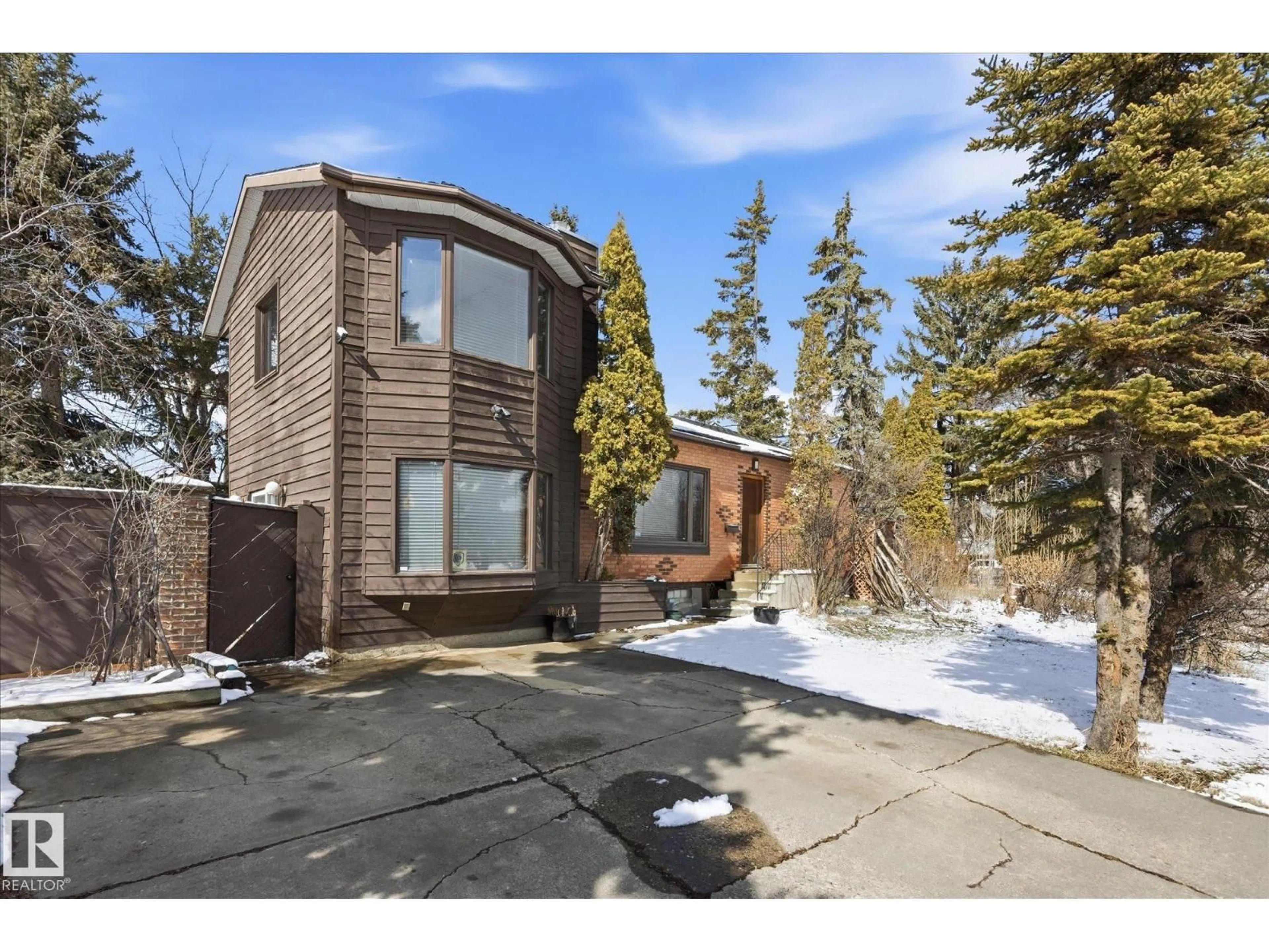 Home with brick exterior material, street for 11026 110 AV NW, Edmonton Alberta T5H1H9