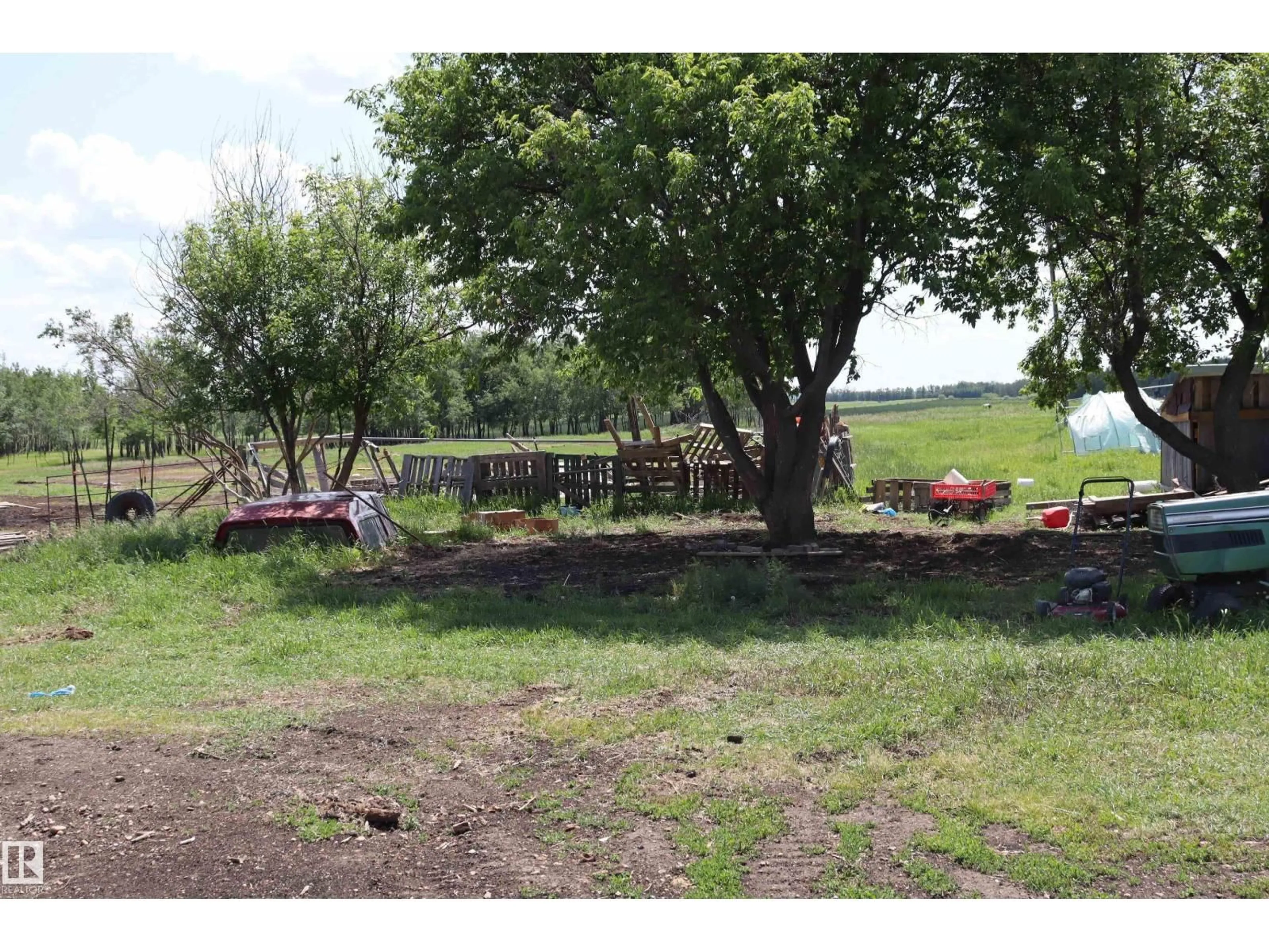 A pic from outside/outdoor area/front of a property/back of a property/a pic from drone, unknown for 214 - 49310 RGR RD RD, Rural Camrose County Alberta T0B2M2