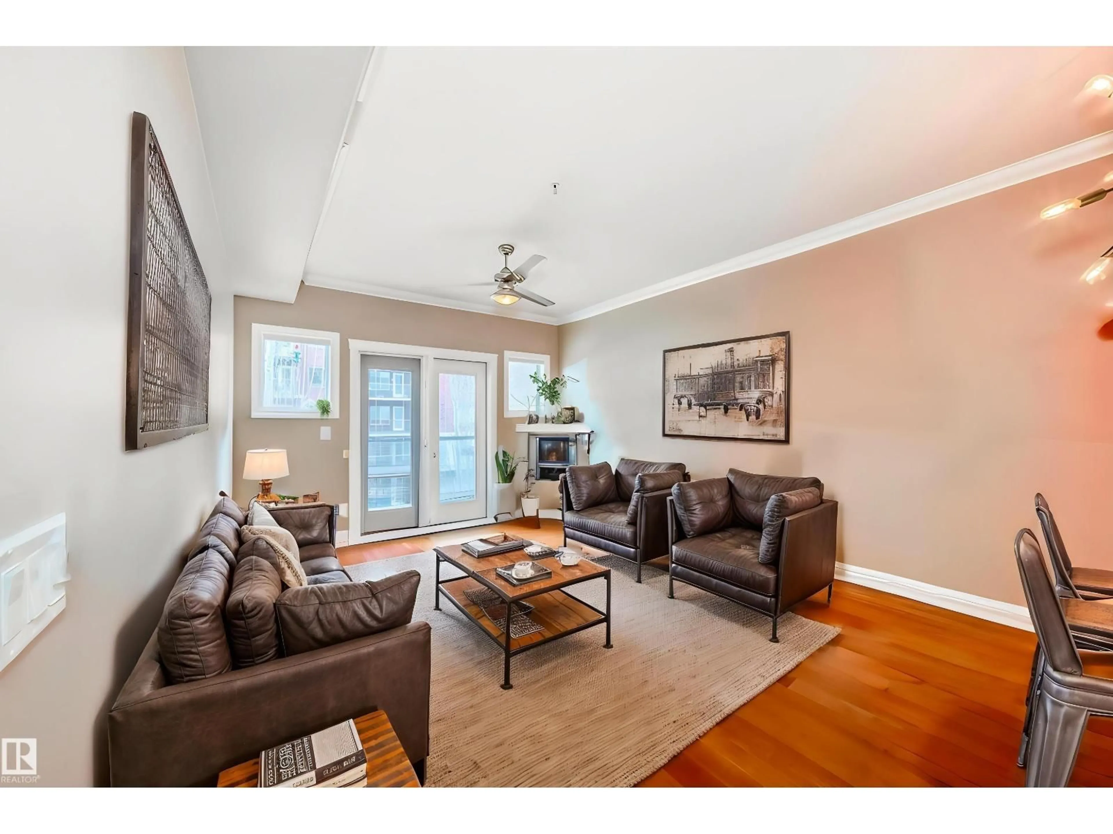 Living room with furniture, wood/laminate floor for #307 - 10121 80 AV, Edmonton Alberta T6E0B9