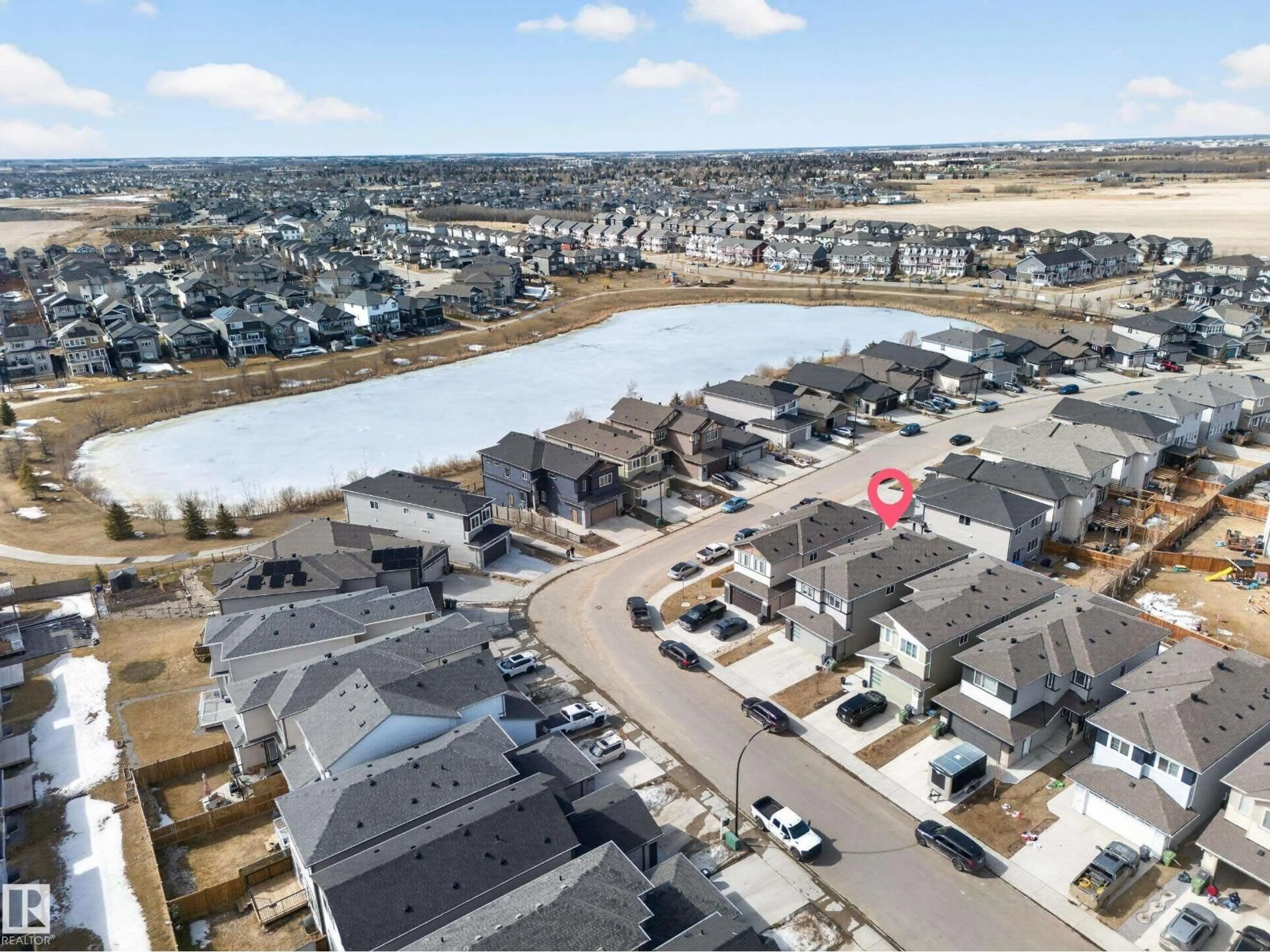 A pic from outside/outdoor area/front of a property/back of a property/a pic from drone, water/lake/river/ocean view for 449 ROBERTS CR, Leduc Alberta T9E1N4