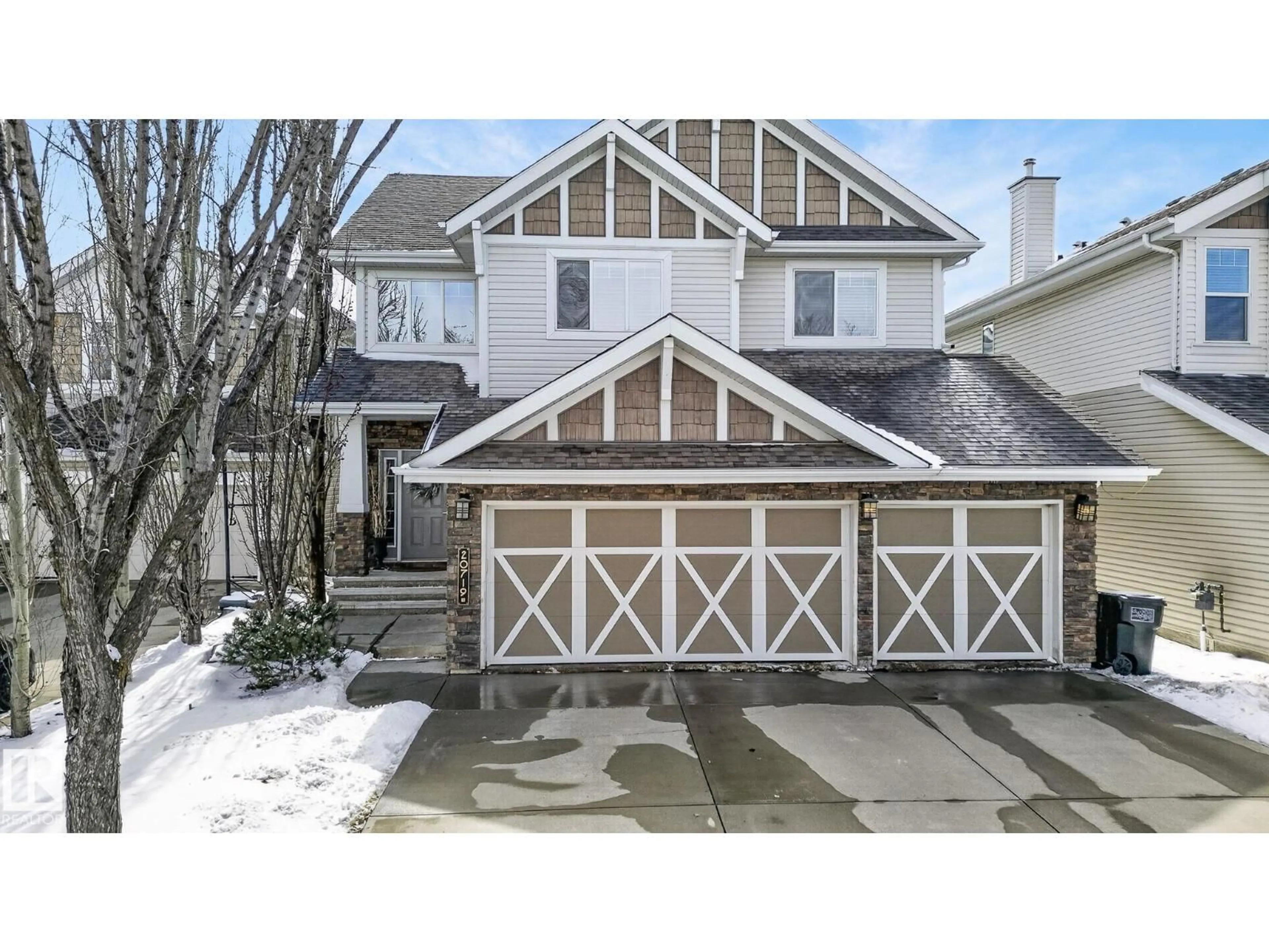 Home with vinyl exterior material, street for 20719 51 AV, Edmonton Alberta T6M3A1