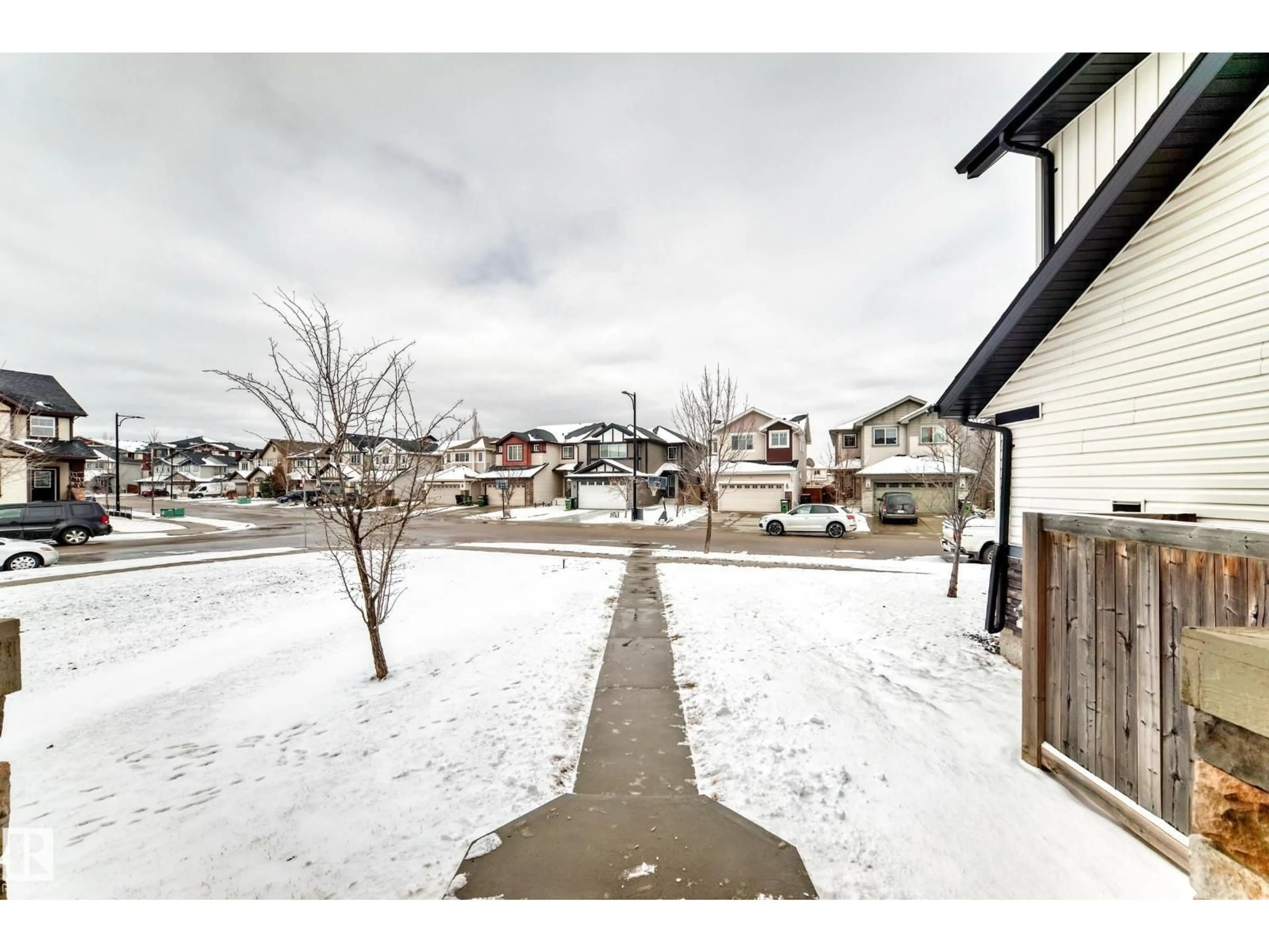 A pic from outside/outdoor area/front of a property/back of a property/a pic from drone, street for 4044 ALEXANDER WY, Edmonton Alberta T6W2C6