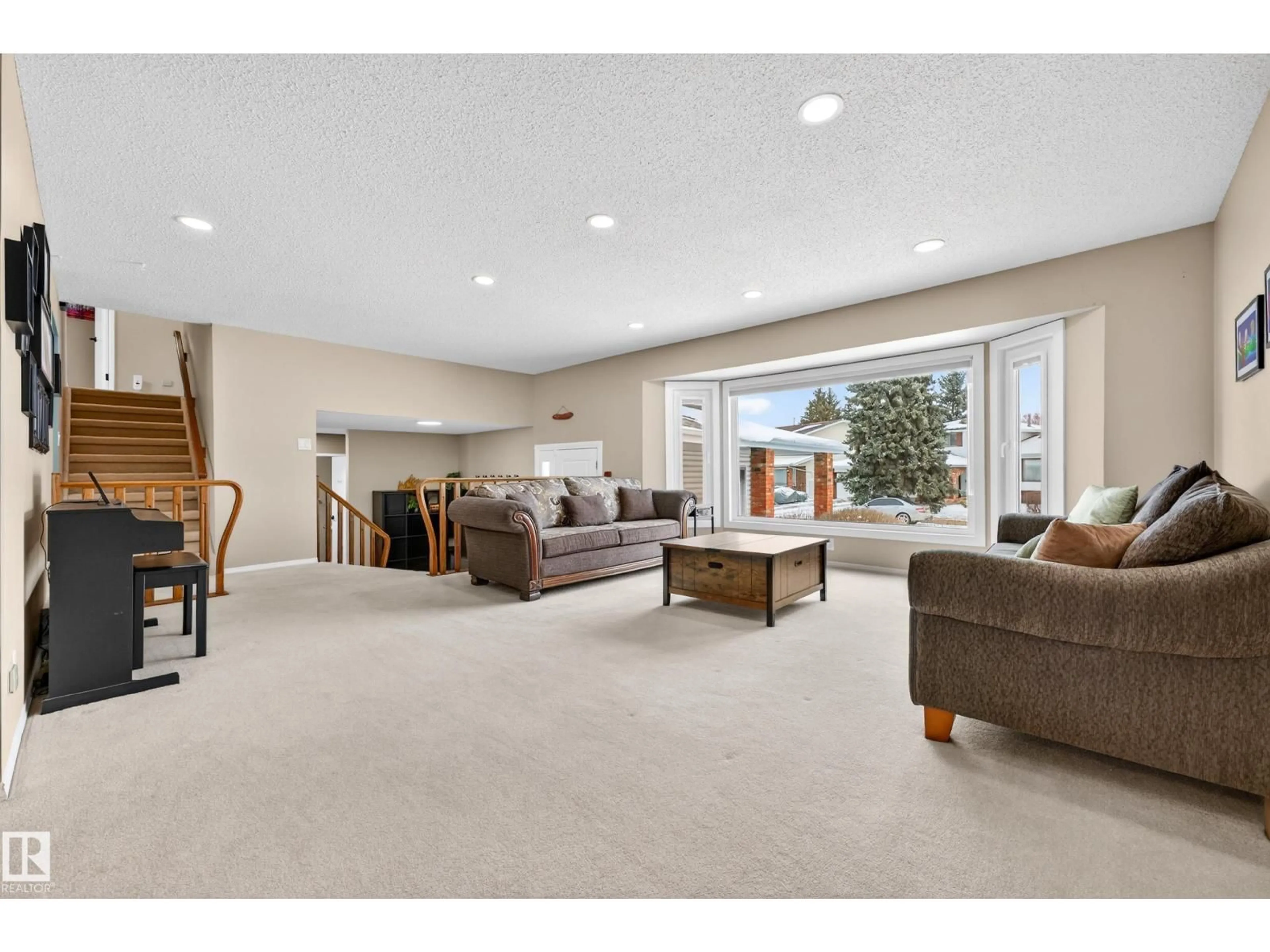 Living room with furniture, carpet floor for 3010 105A ST NW, Edmonton Alberta T6J3A5