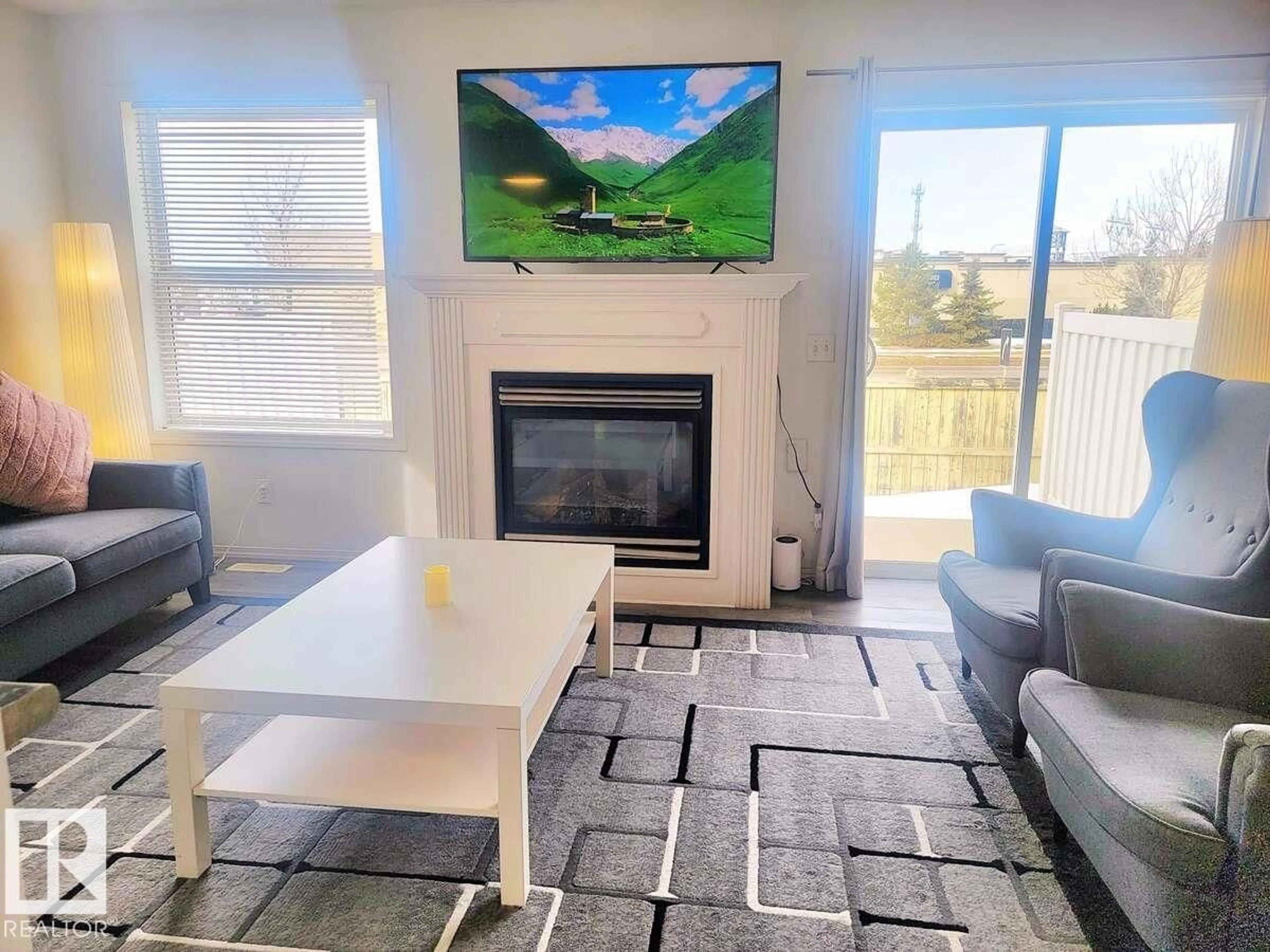 Living room with furniture, unknown for 33 - 249 EDWARDS DR, Edmonton Alberta T6X1G2