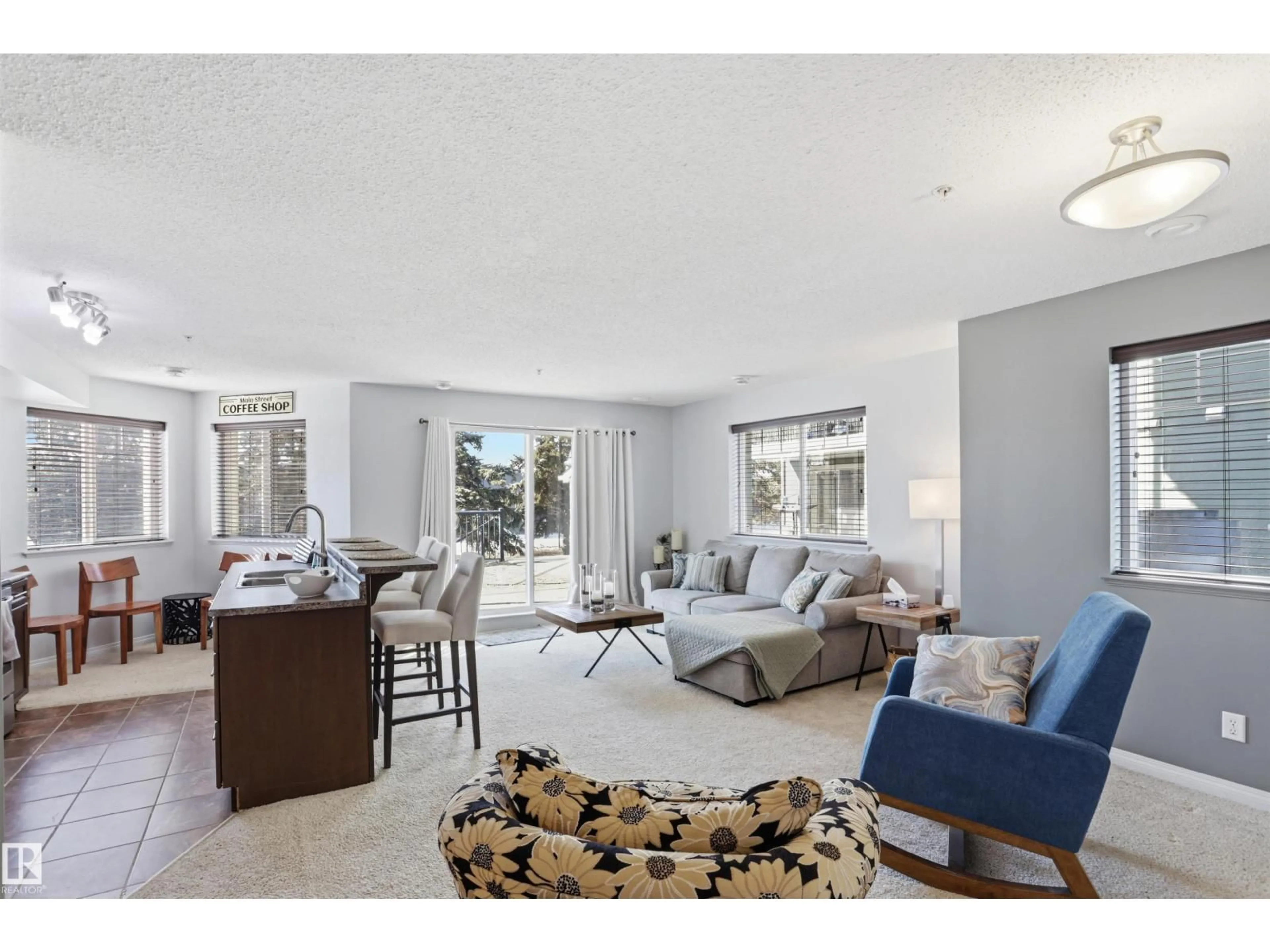 Living room with furniture, unknown for #115 - 6925 199 ST, Edmonton Alberta T5T3X8