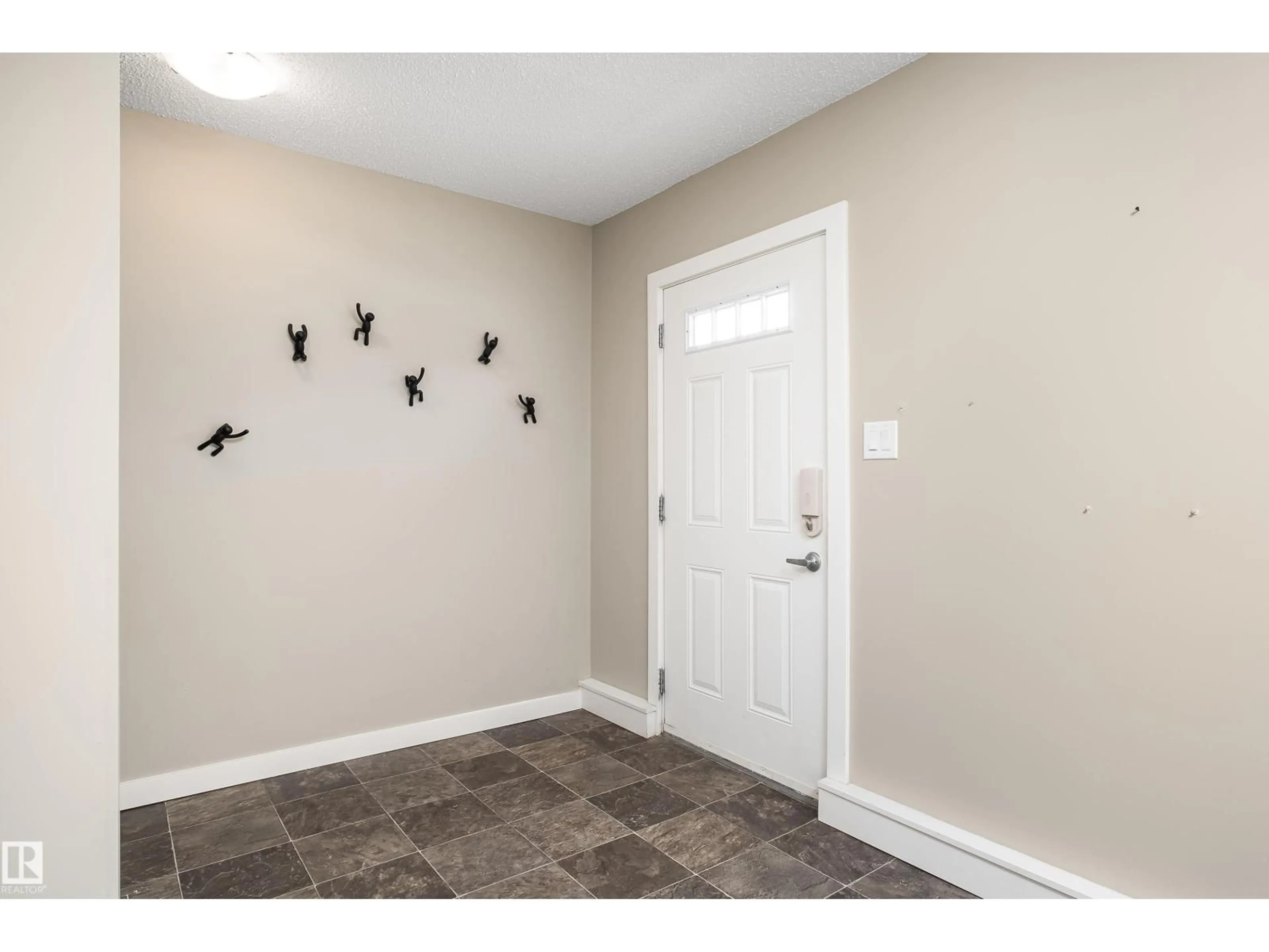 Indoor entryway for #39 - 2803 JAMES MOWATT TR, Edmonton Alberta T6W2P5