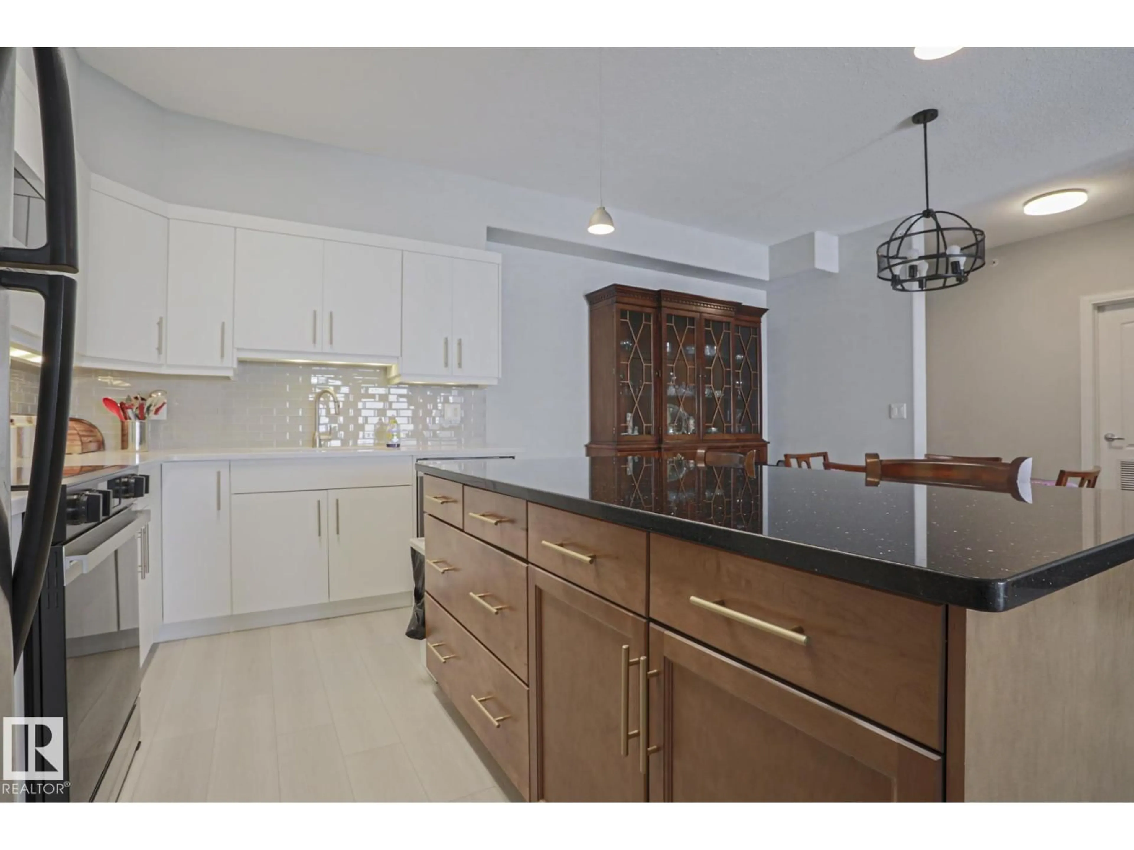 Open concept kitchen, ceramic/tile floor for #432 - 1406 HODGSON WY, Edmonton Alberta T6R1K3