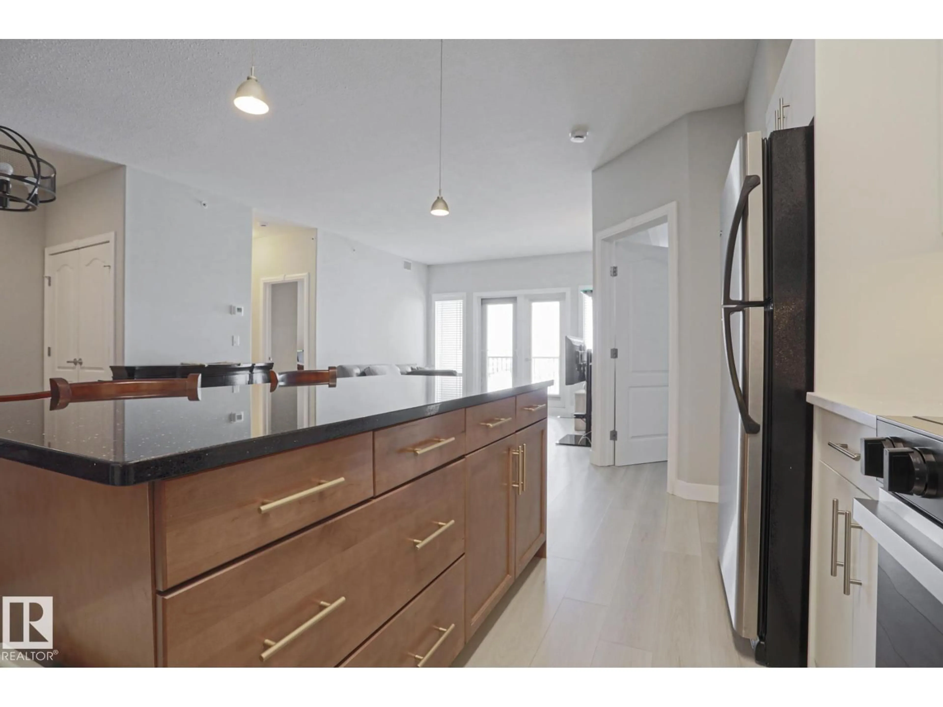 Open concept kitchen, unknown for #432 - 1406 HODGSON WY, Edmonton Alberta T6R1K3