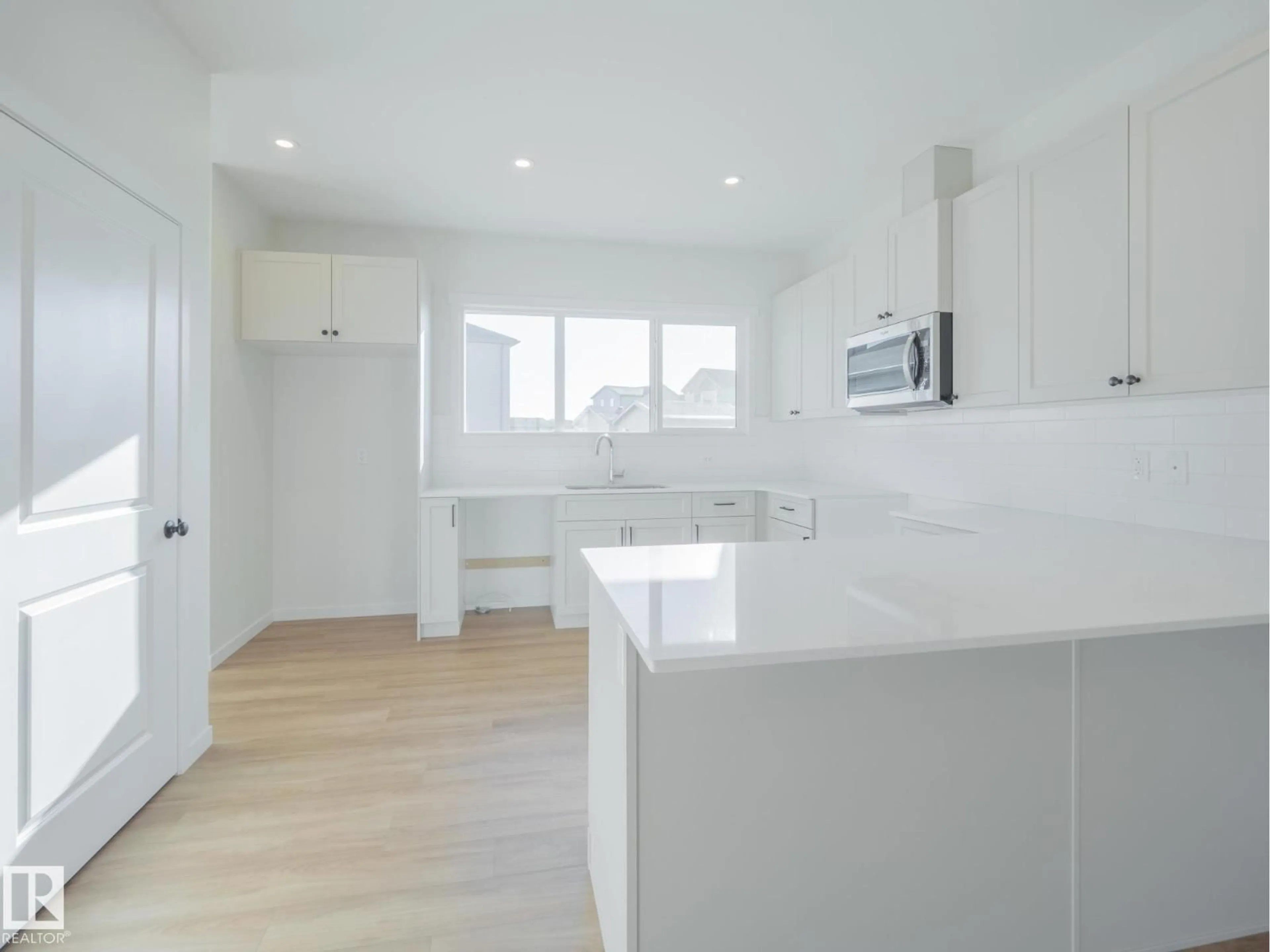 Open concept kitchen, unknown for NW - 17227 4 ST, Edmonton Alberta T5Y4K8