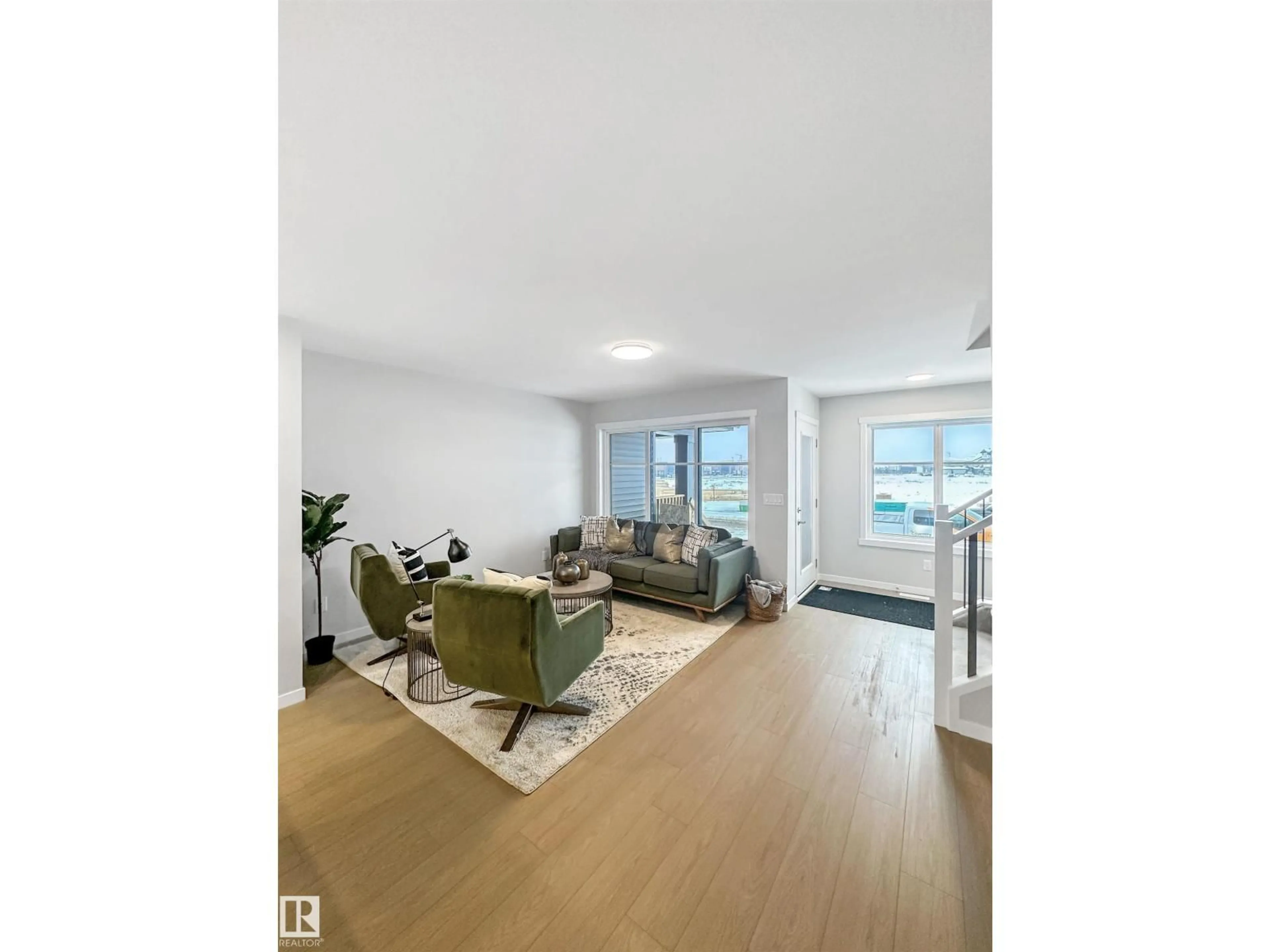 Living room with furniture, unknown for 173 GRIESBACH RD, Edmonton Alberta T5E7A8