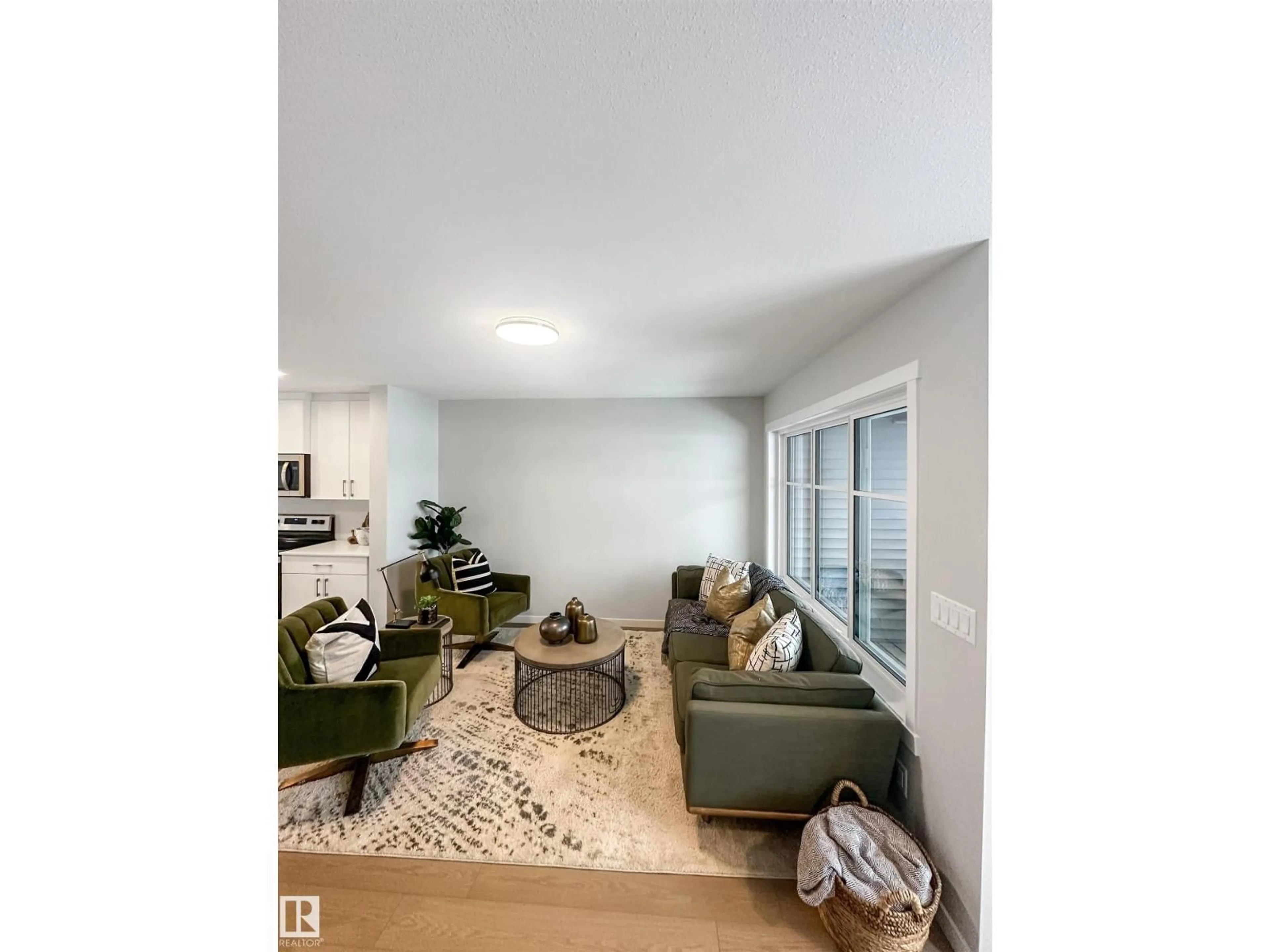 Living room with furniture, unknown for 173 GRIESBACH RD, Edmonton Alberta T5E7A8