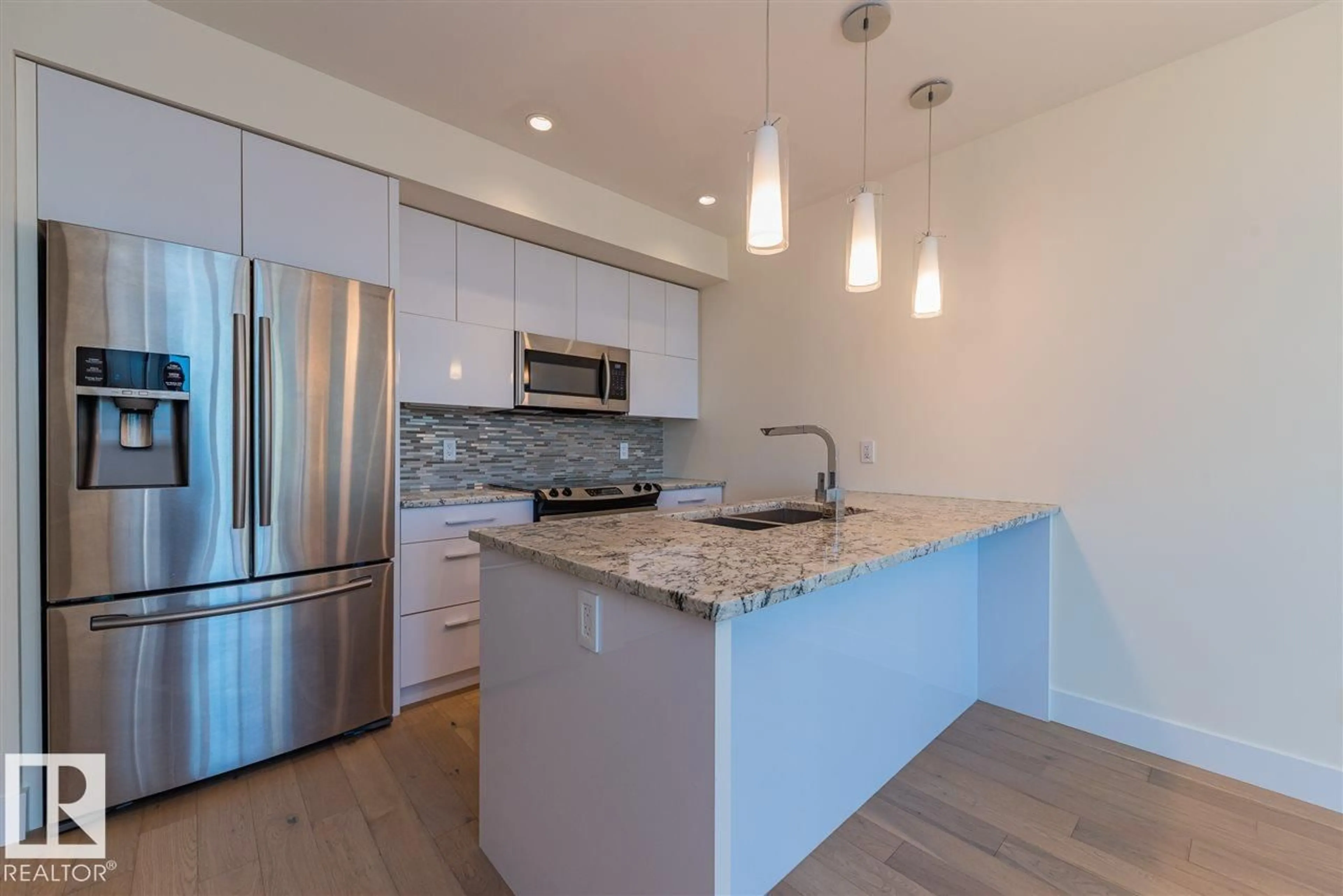 Open concept kitchen, unknown for #401 - 11969 JASPER AV, Edmonton Alberta T5K0P1