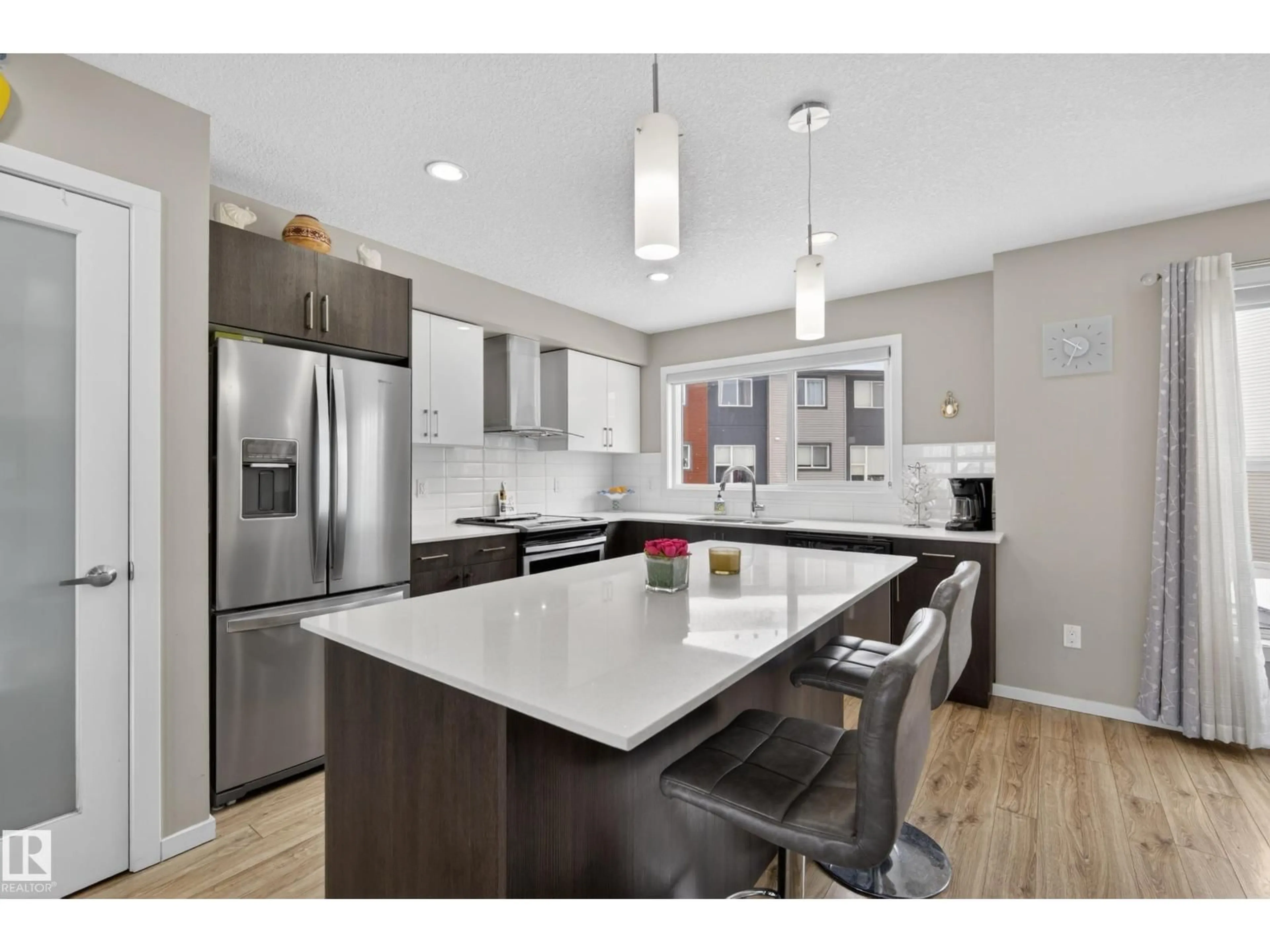 Open concept kitchen, unknown for #32 - 1075 ROSENTHAL BV, Edmonton Alberta T5T7G5