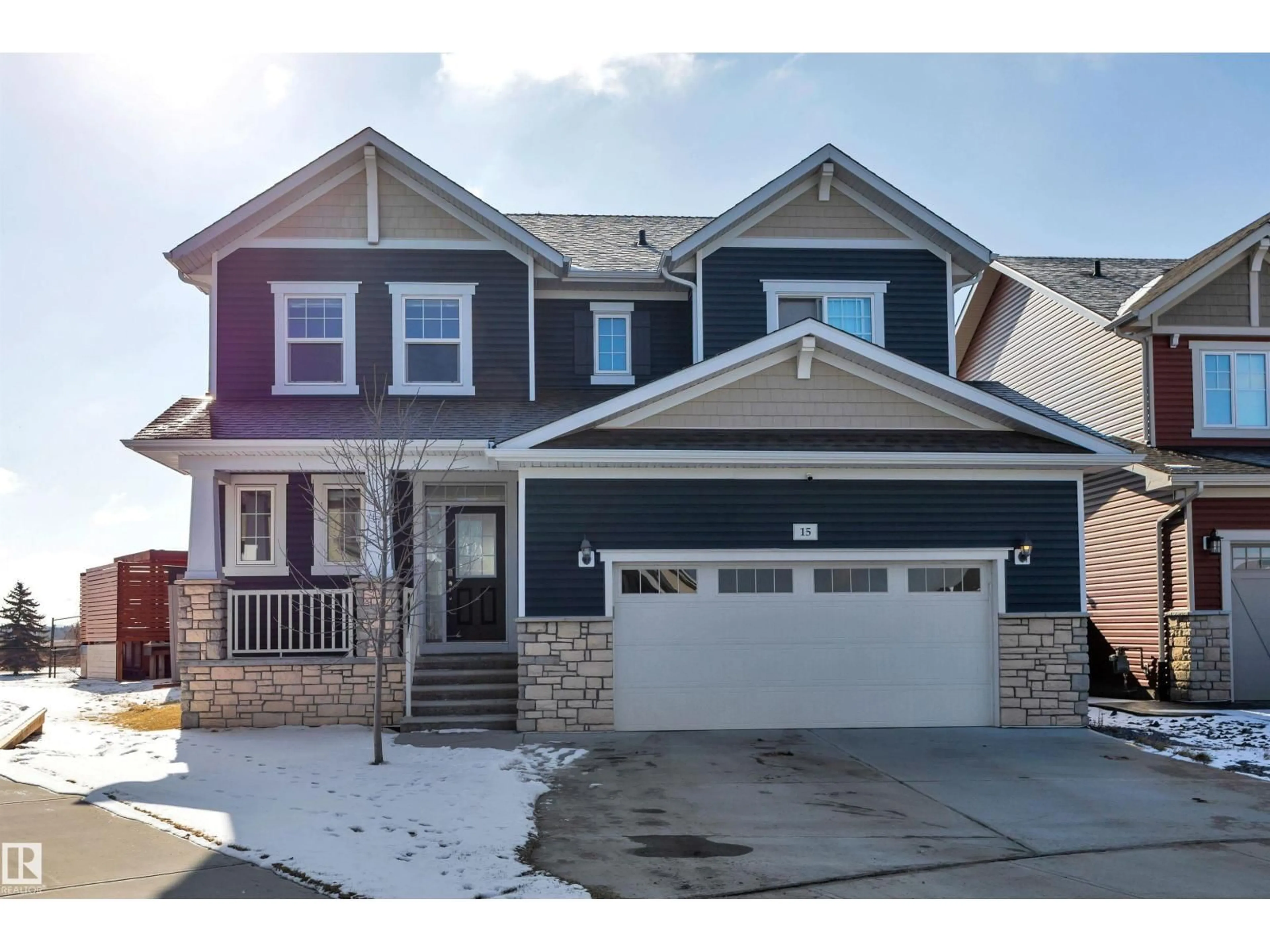 Home with vinyl exterior material, street for 15 PROMENADE PT, Beaumont Alberta T4X2C9