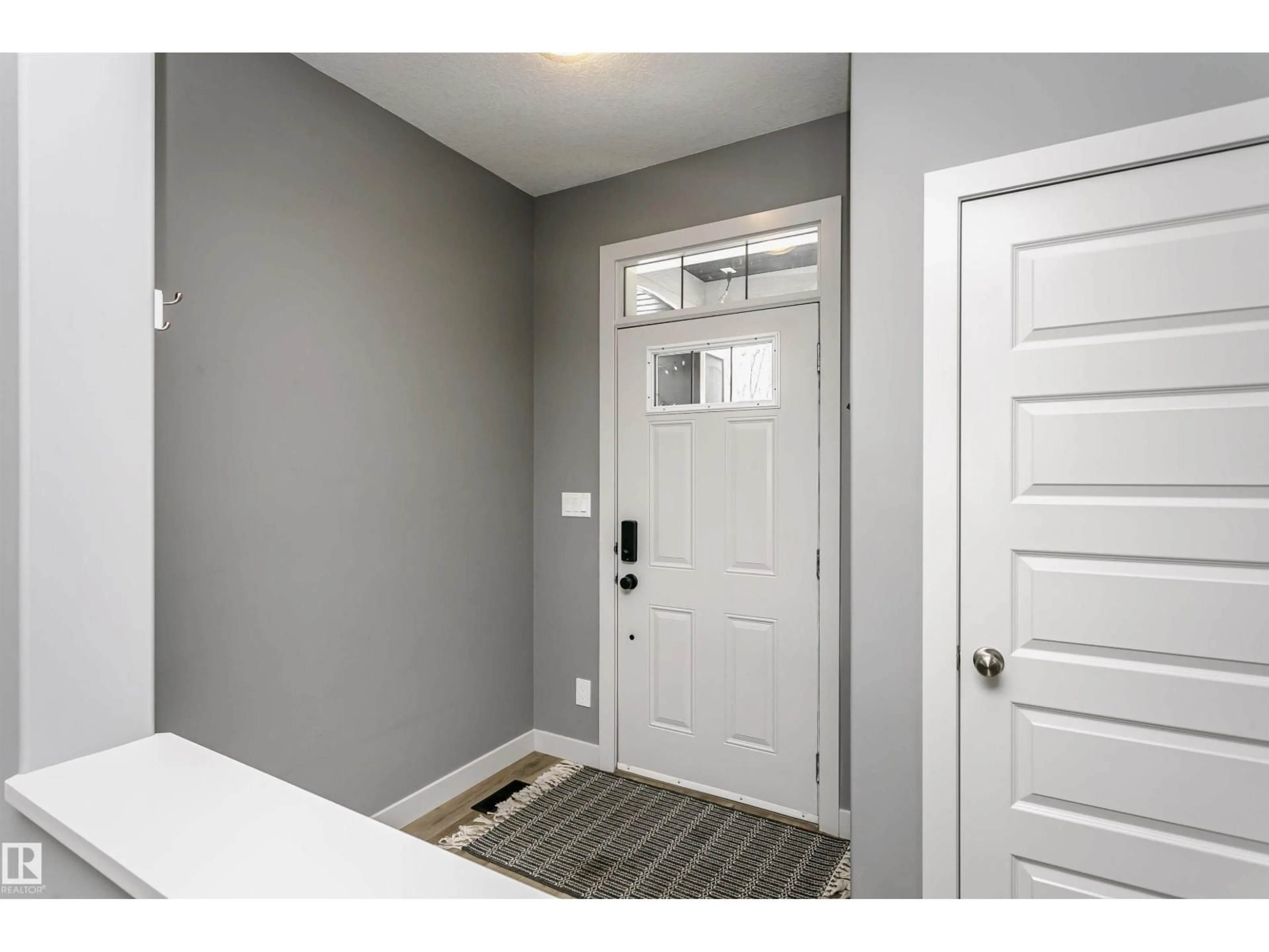 Indoor entryway for 21807 97 AV NW, Edmonton Alberta T5T4H6