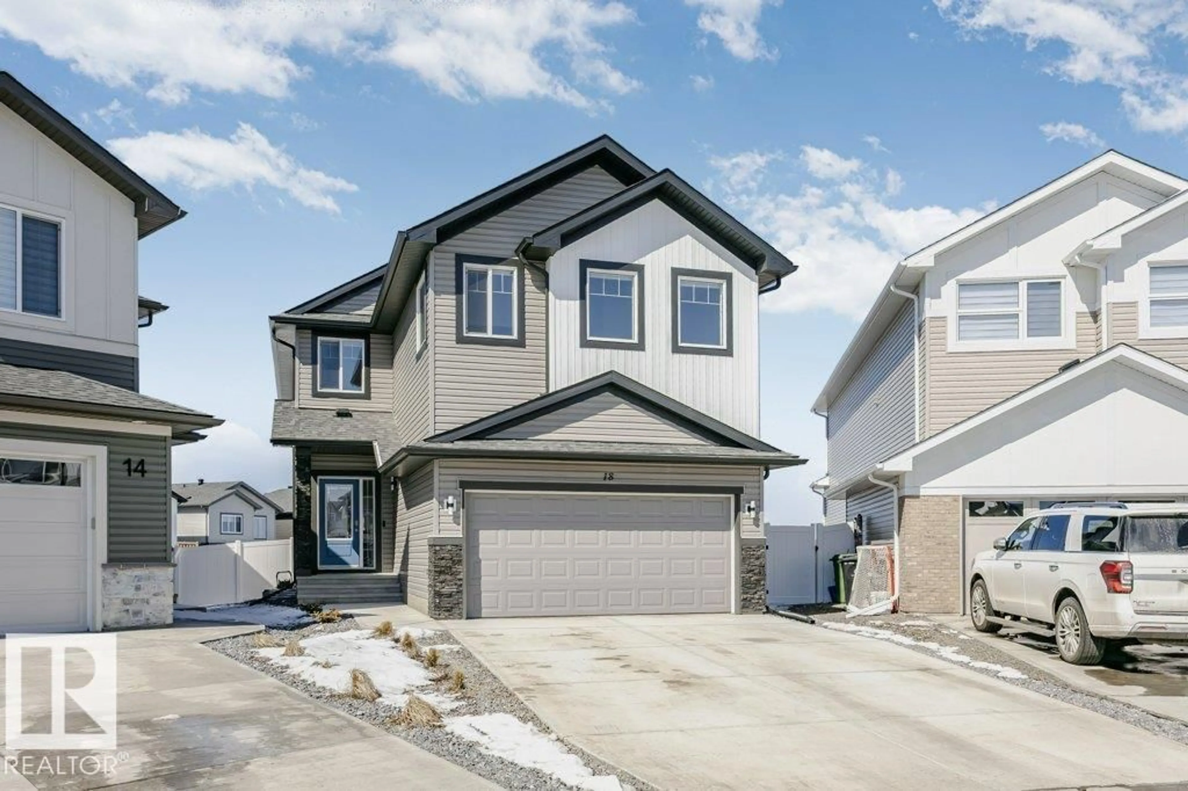 Home with vinyl exterior material, street for 18 ELDERBERRY PT, Fort Saskatchewan Alberta T8L0X8