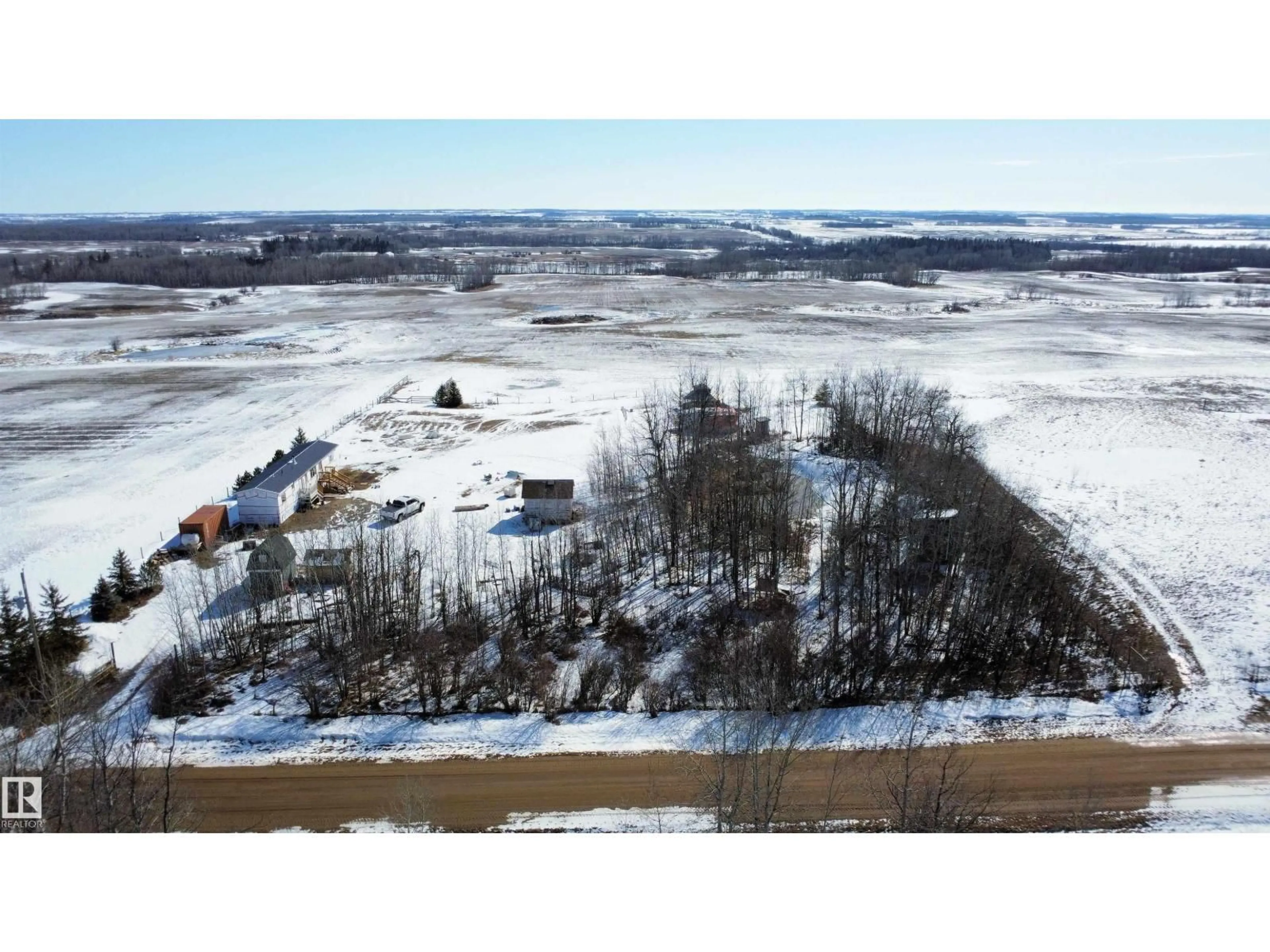 A pic from outside/outdoor area/front of a property/back of a property/a pic from drone, water/lake/river/ocean view for 56523 RGE ROAD 12, Rural Sturgeon County Alberta T8R0L3