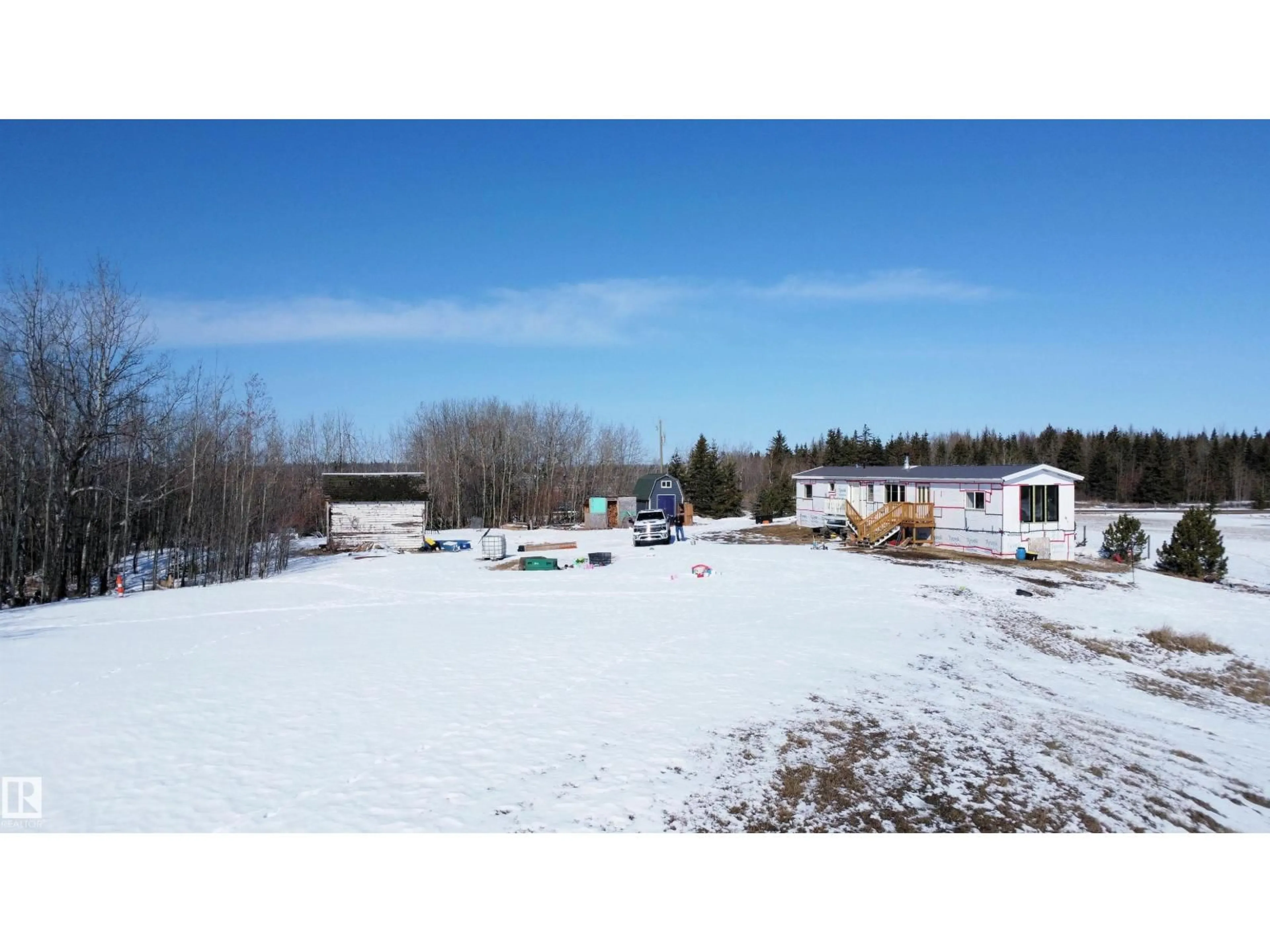 A pic from outside/outdoor area/front of a property/back of a property/a pic from drone, unknown for 56523 RGE ROAD 12, Rural Sturgeon County Alberta T8R0L3