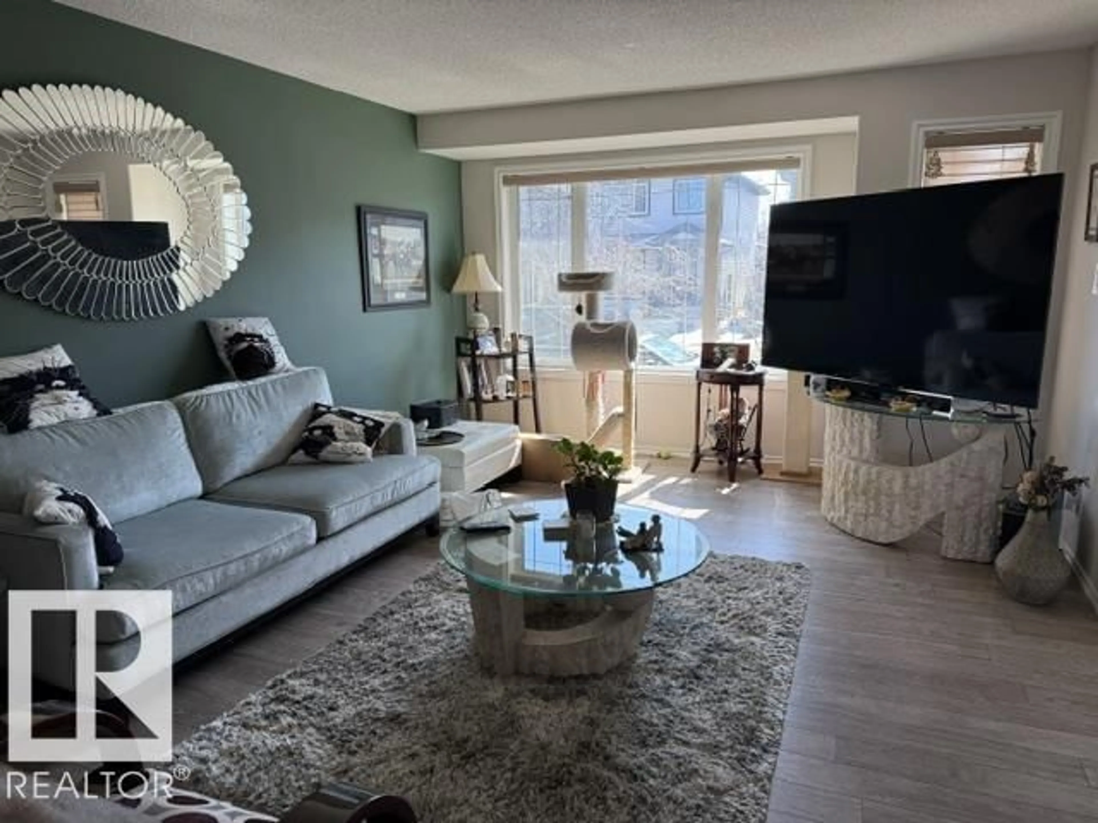 Living room with furniture, unknown for 21316 95 AV, Edmonton Alberta T5T4C9