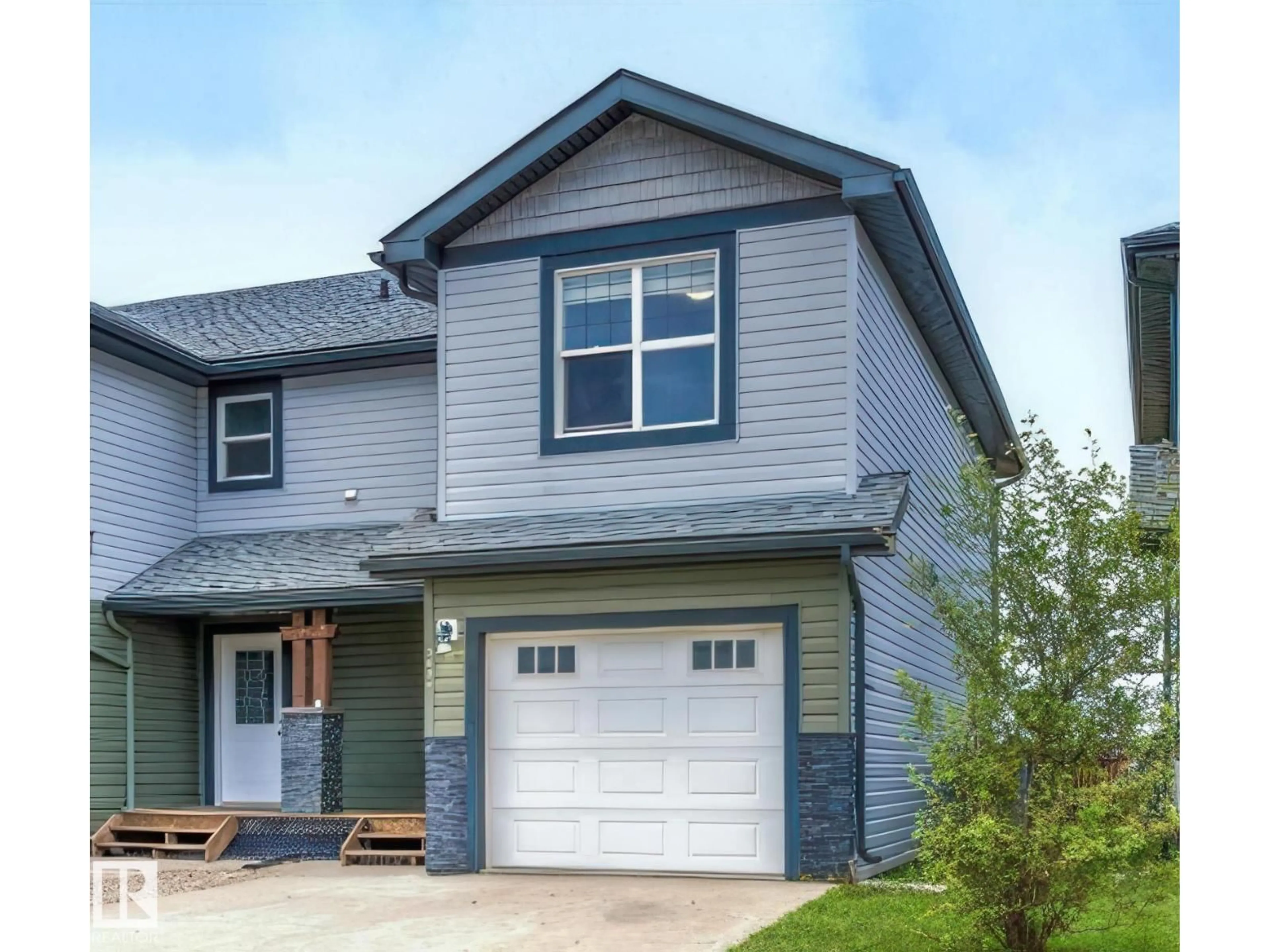 Home with vinyl exterior material, street for 703A ROCKY WY, Cold Lake Alberta T9M0H3