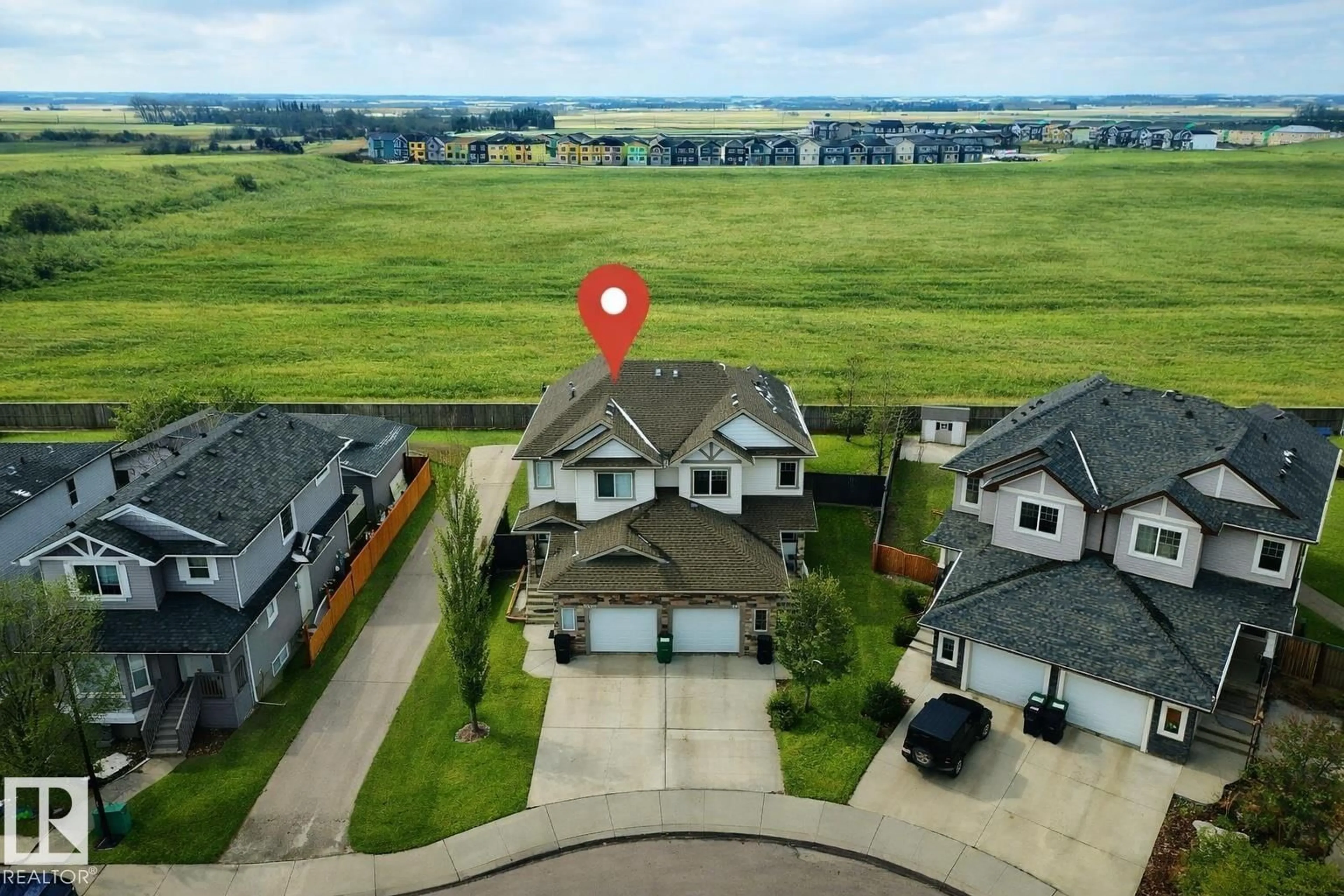 A pic from outside/outdoor area/front of a property/back of a property/a pic from drone, unknown for 132 KIRPATRICK WY, Leduc Alberta T9E0Z2