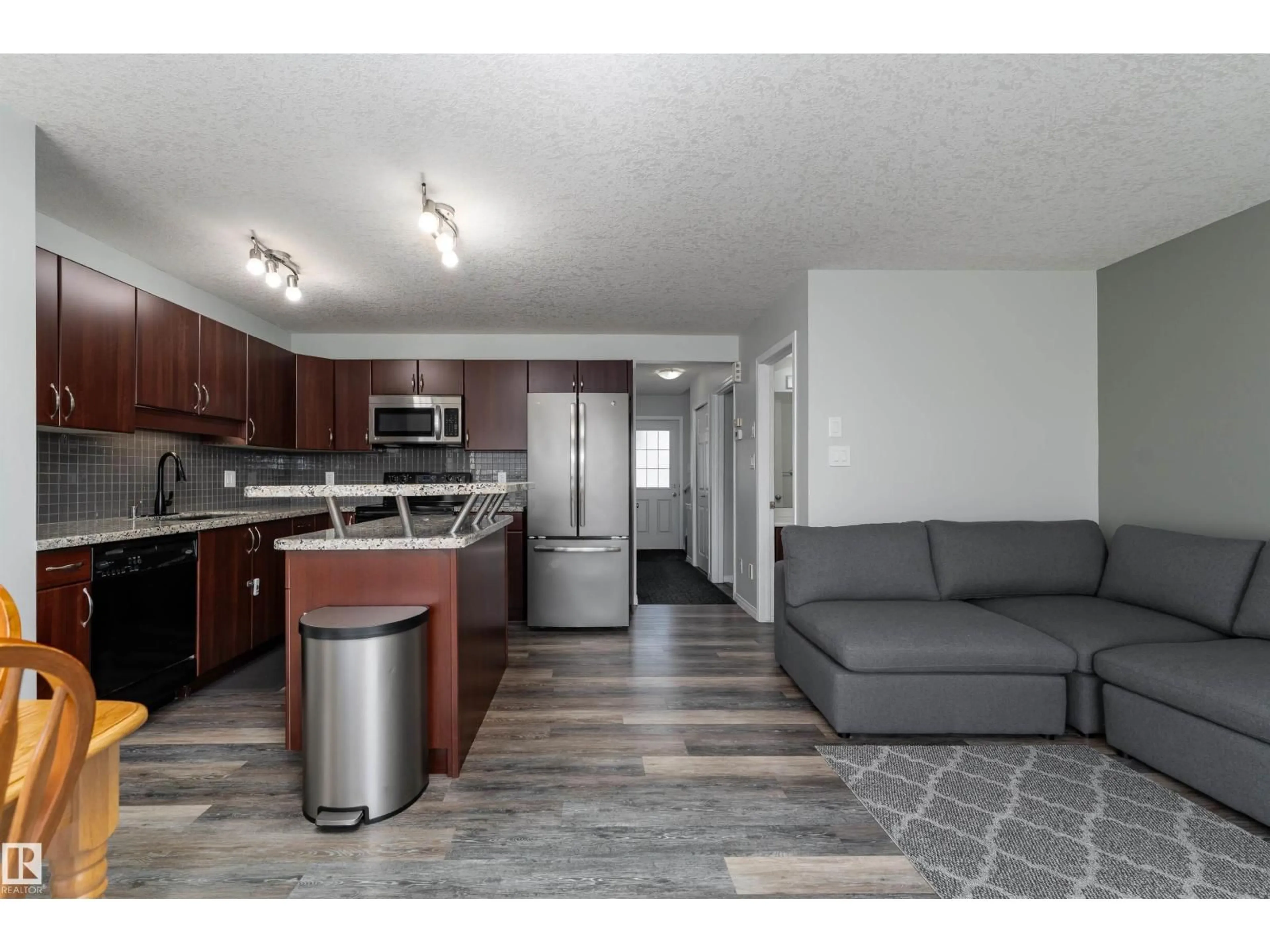 Open concept kitchen, unknown for 5911 8 AV SW, Edmonton Alberta T6X0G5