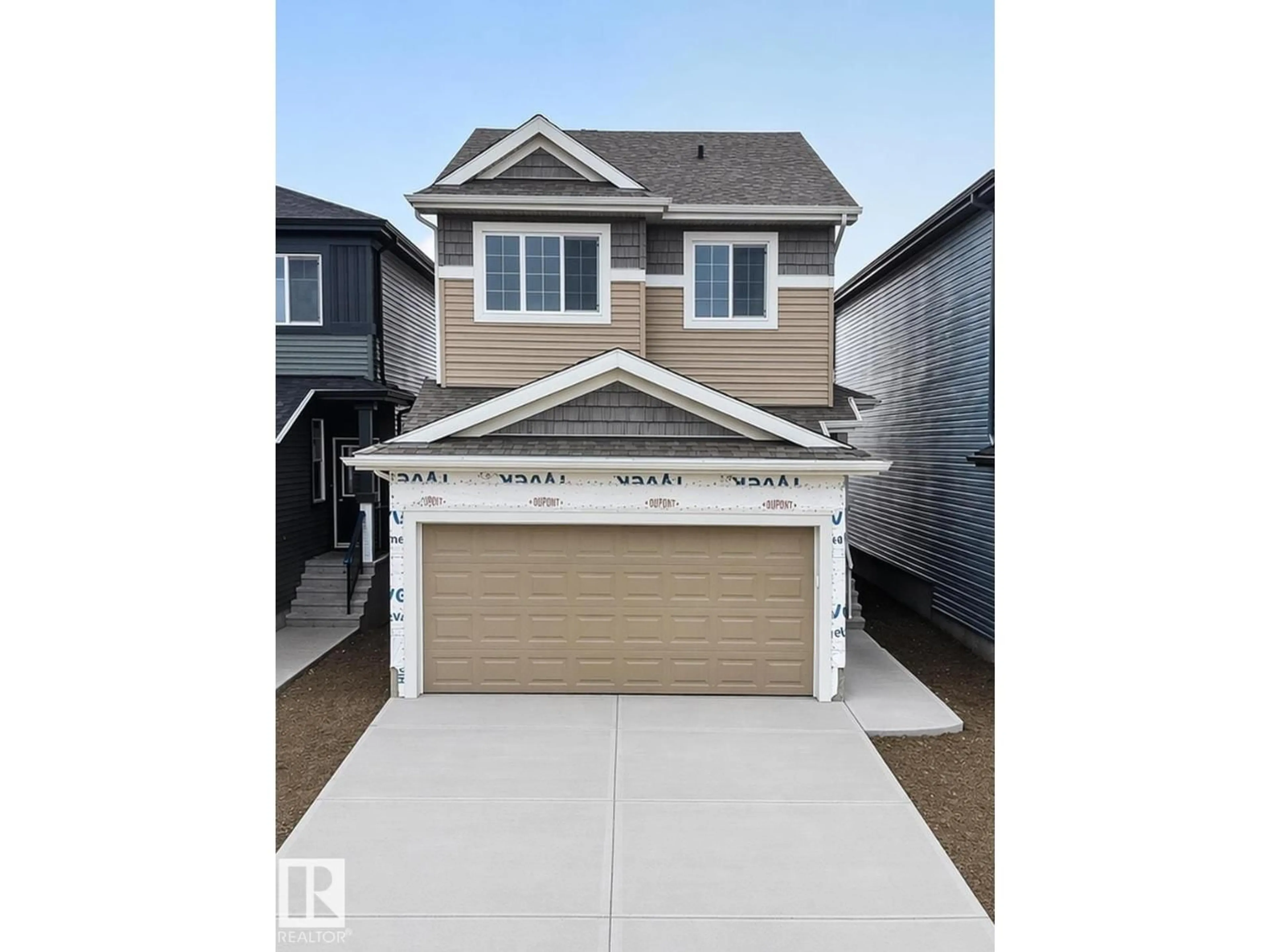Home with vinyl exterior material, street for 284 LODGE POLE PL, Leduc Alberta T9E0K7