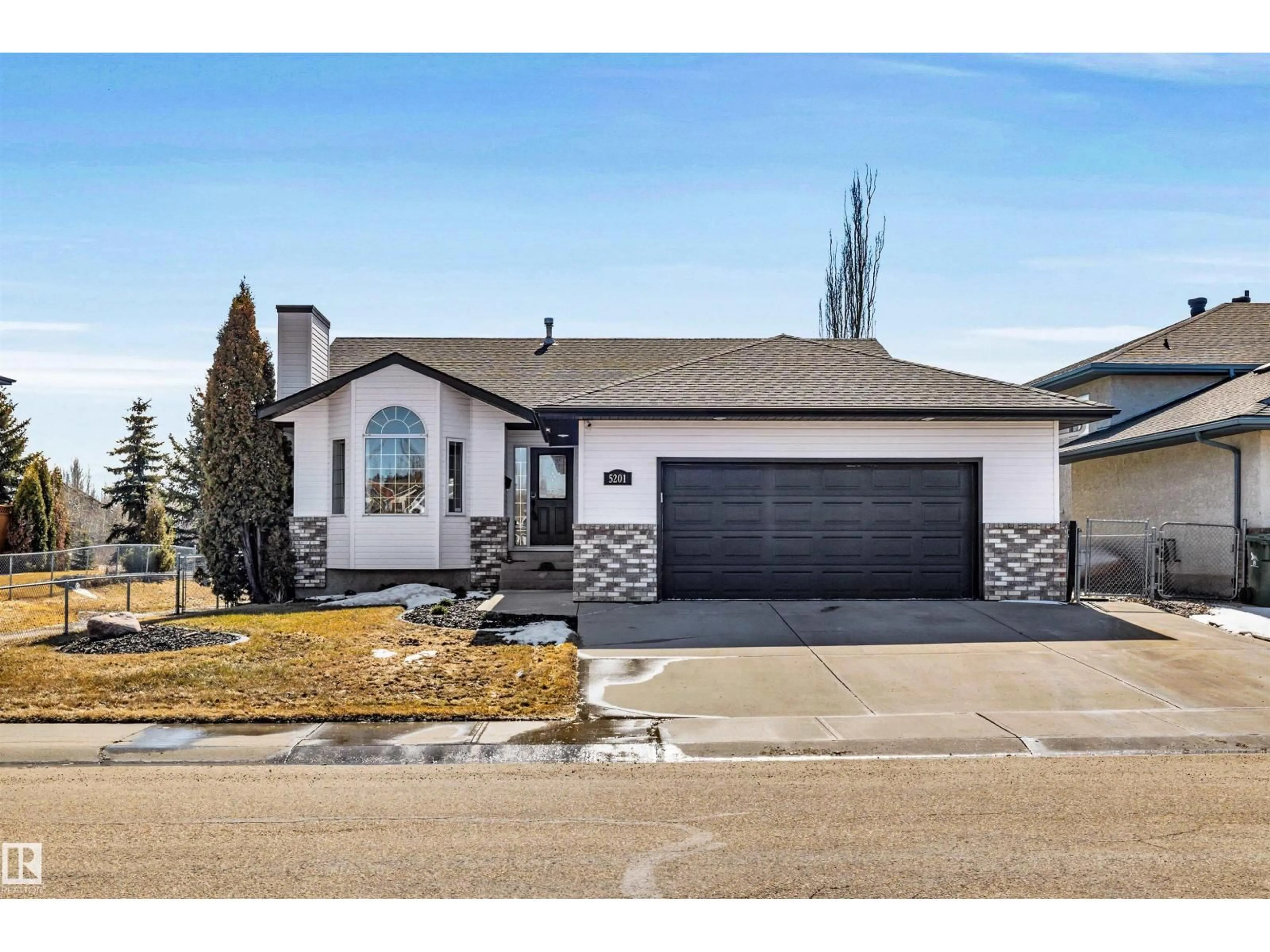 Home with vinyl exterior material, street for 5201 40 AV, Beaumont Alberta T4X1N6