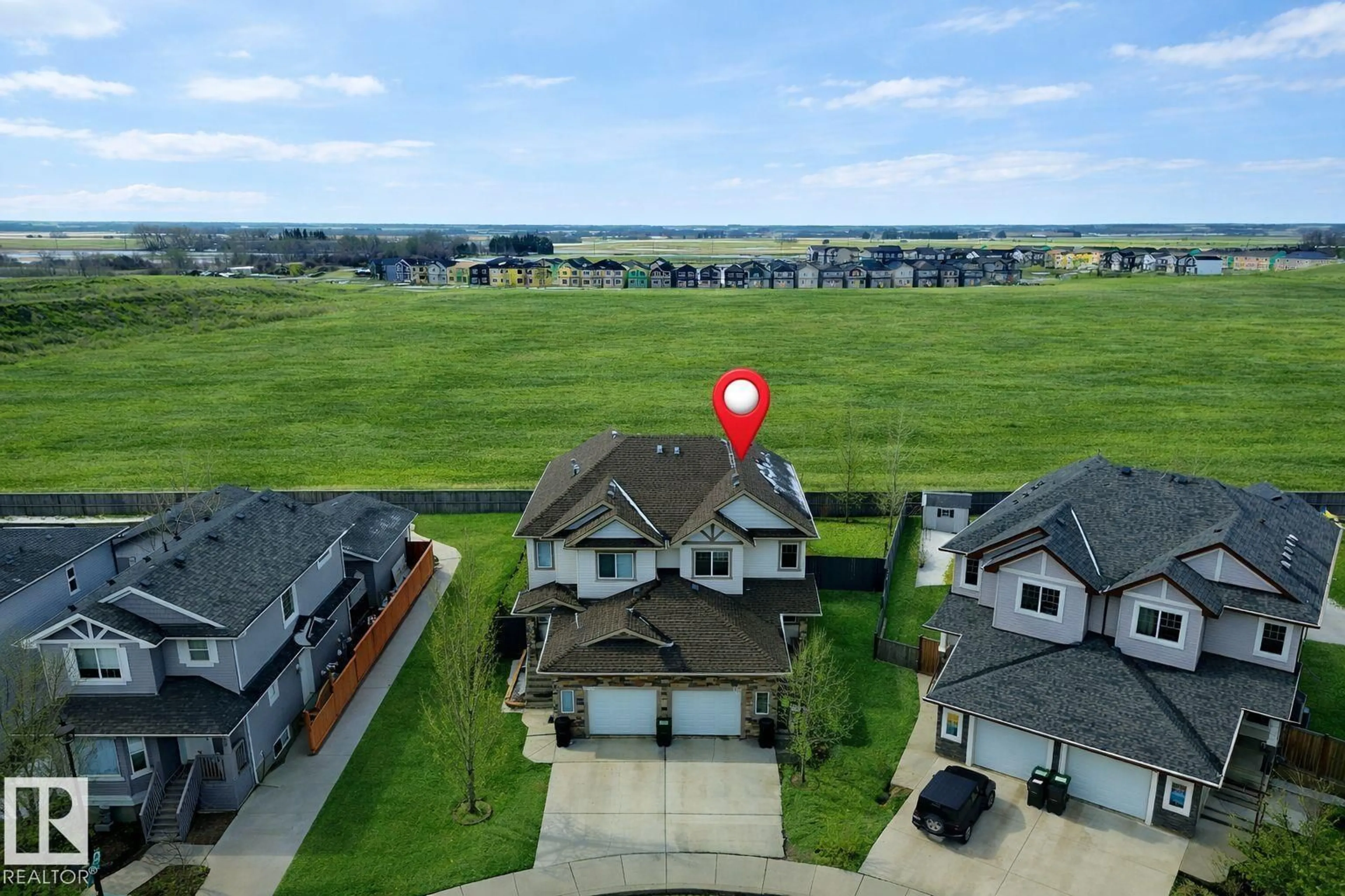 A pic from outside/outdoor area/front of a property/back of a property/a pic from drone, unknown for 130 KIRPATRICK WY, Leduc Alberta T9E0Z2