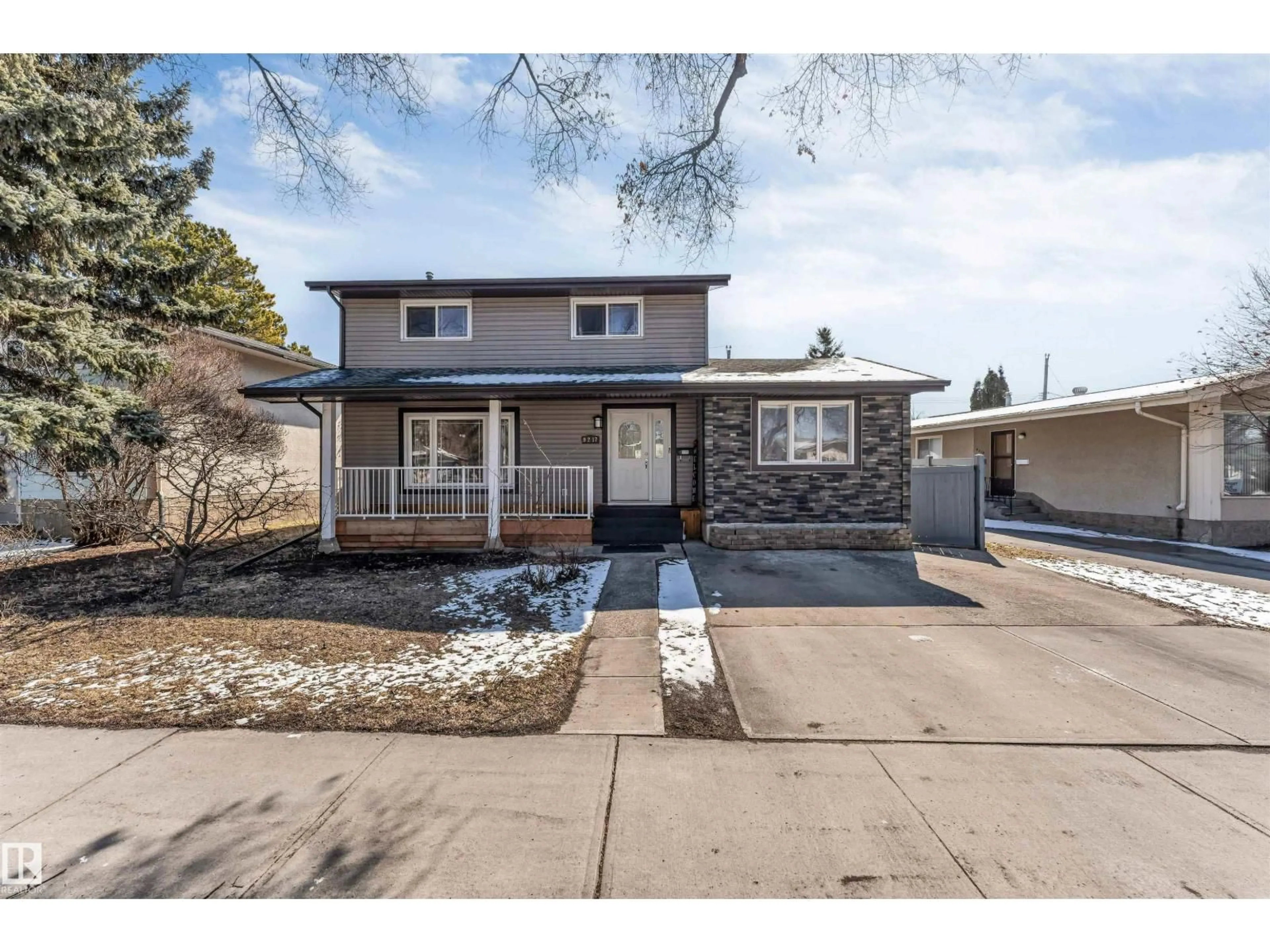 Home with vinyl exterior material, street for NW - 9217 168 ST, Edmonton Alberta T5R2V8