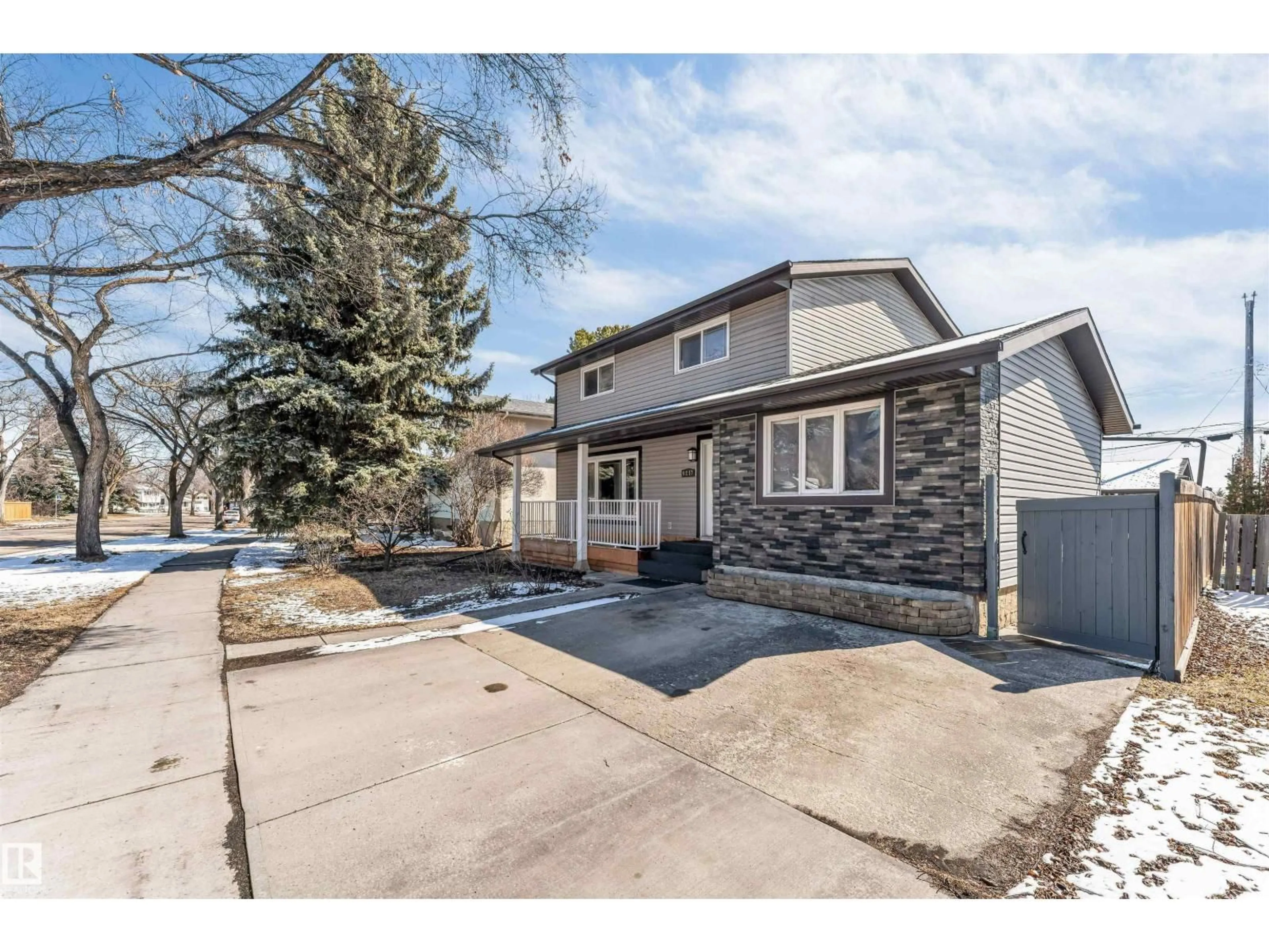 Home with brick exterior material, street for NW - 9217 168 ST, Edmonton Alberta T5R2V8