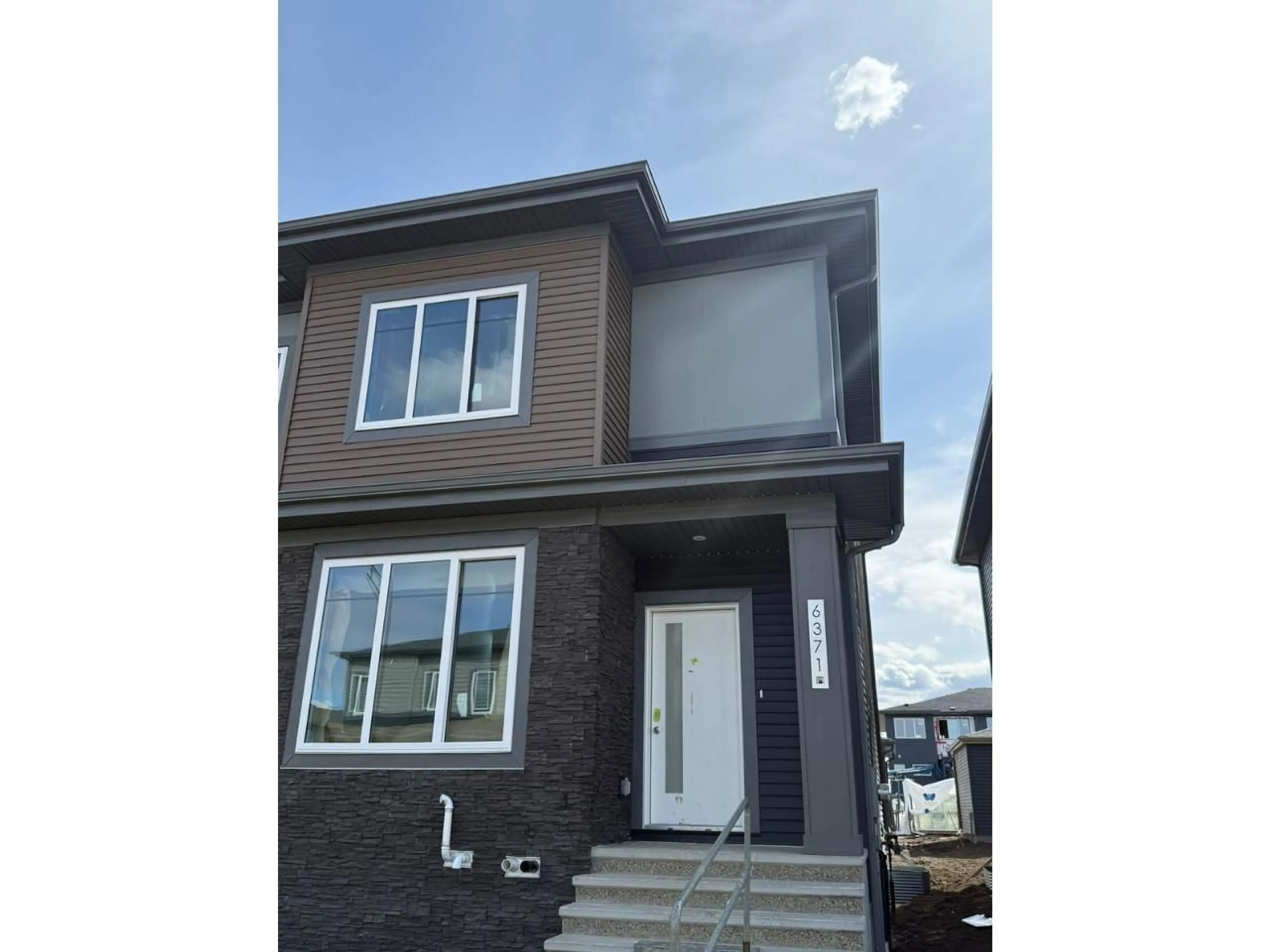 Home with vinyl exterior material, street for 6371 KING WD, Edmonton Alberta T6W5J3