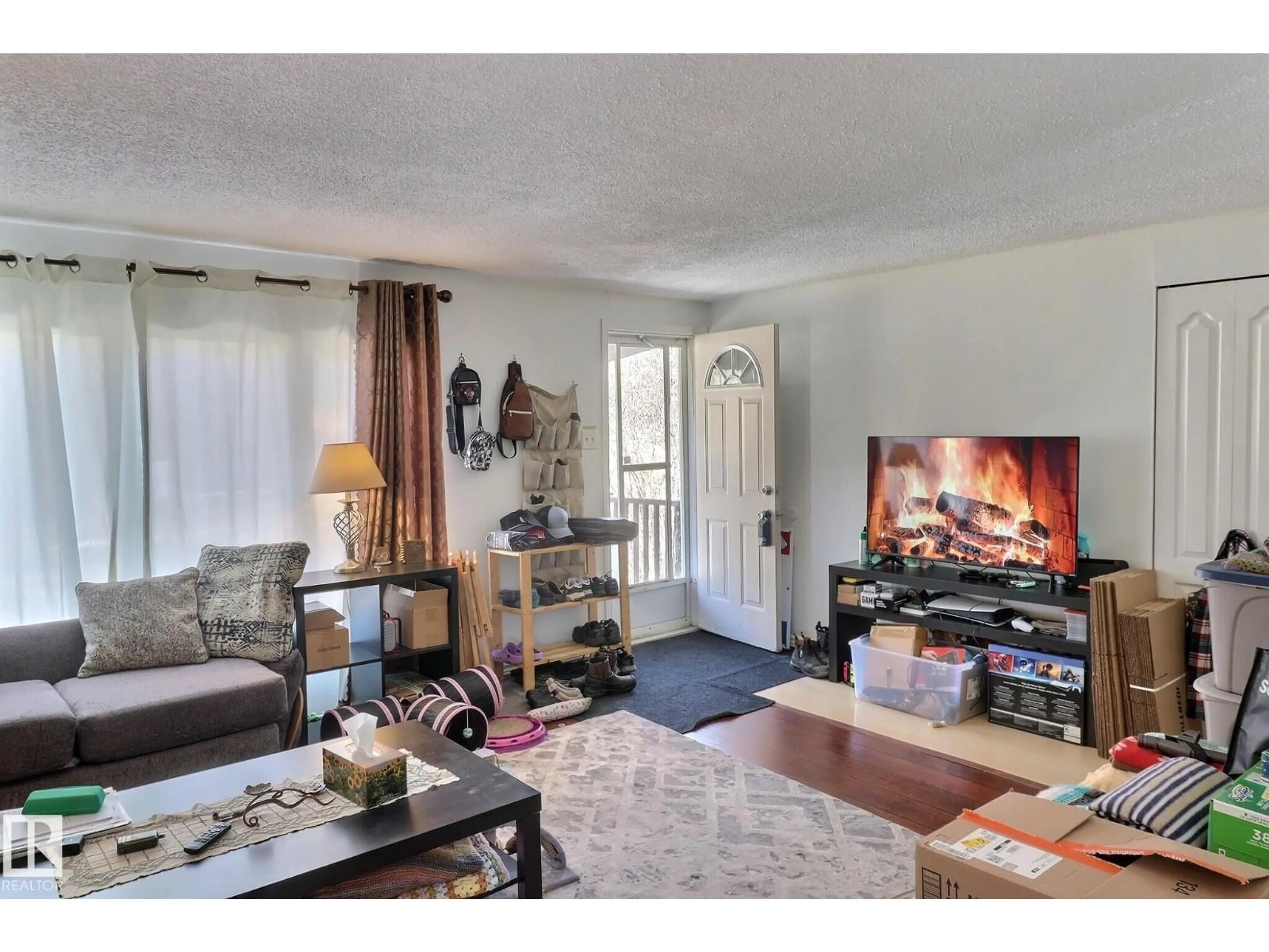 Living room with furniture, wood/laminate floor for 460 EVERGREEN PA, Edmonton Alberta T5Y4M2
