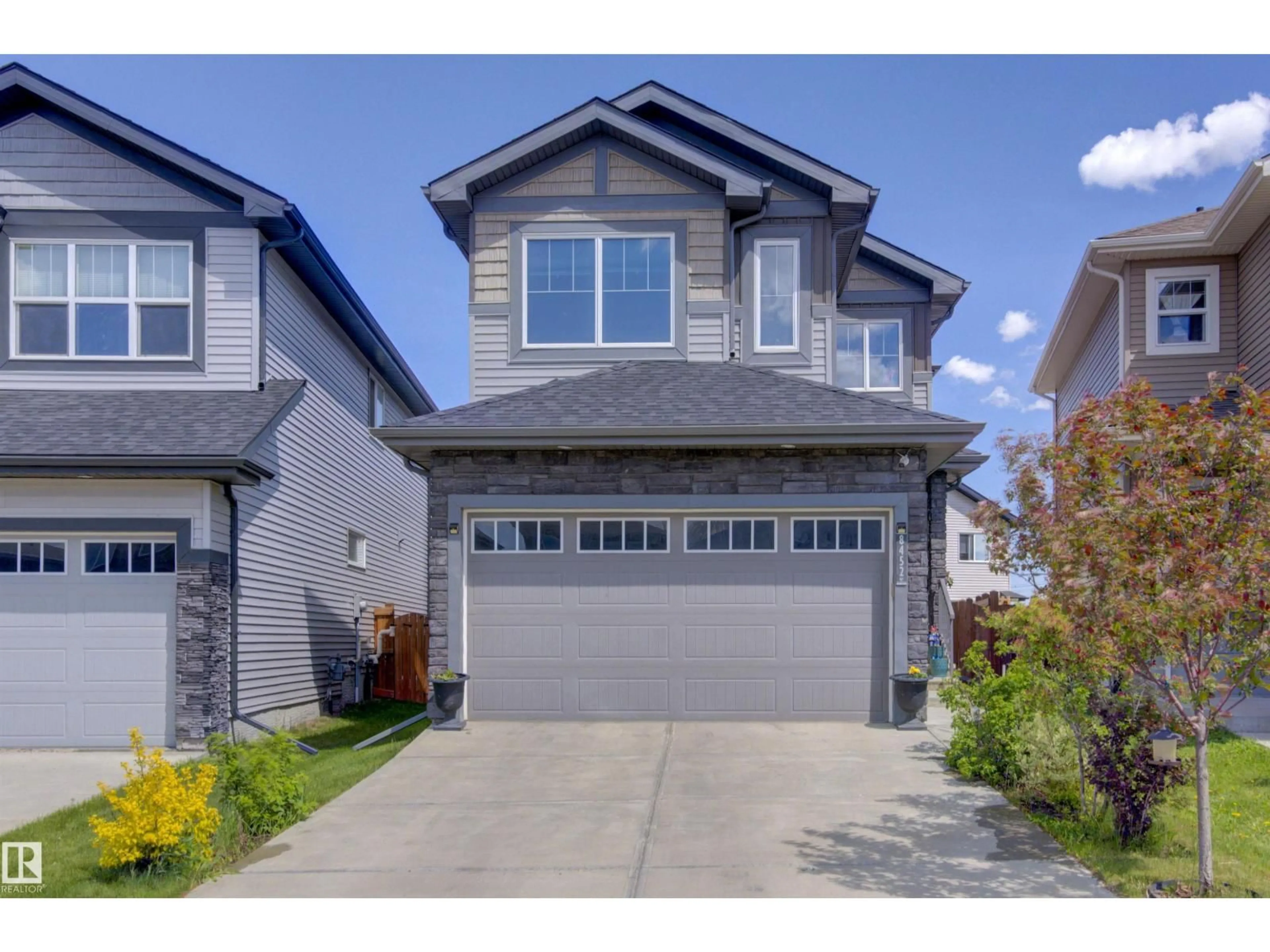 Home with vinyl exterior material, street for 8452 CUSHING CT, Edmonton Alberta T6W3L3