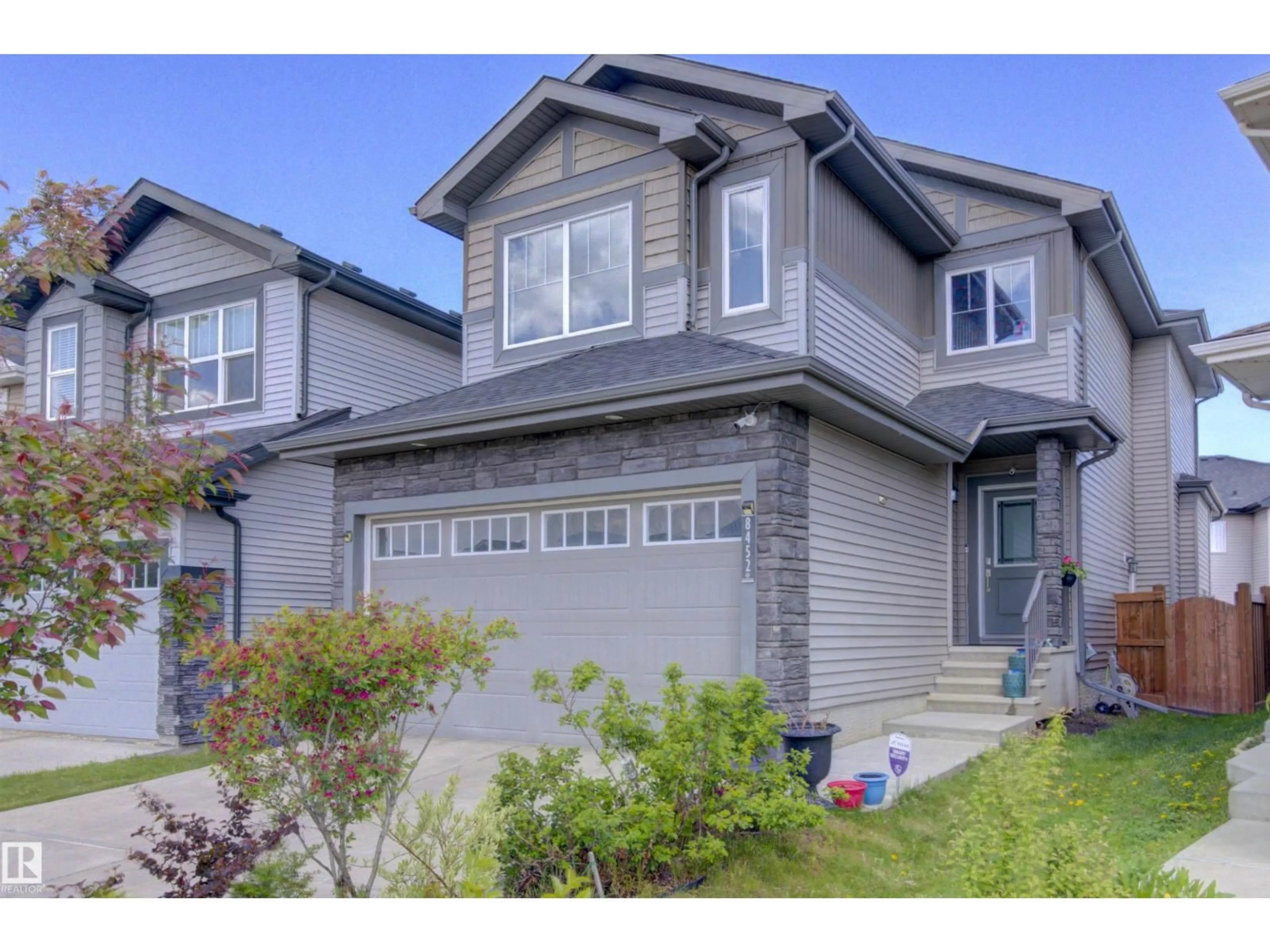 Home with vinyl exterior material, street for 8452 CUSHING CT, Edmonton Alberta T6W3L3
