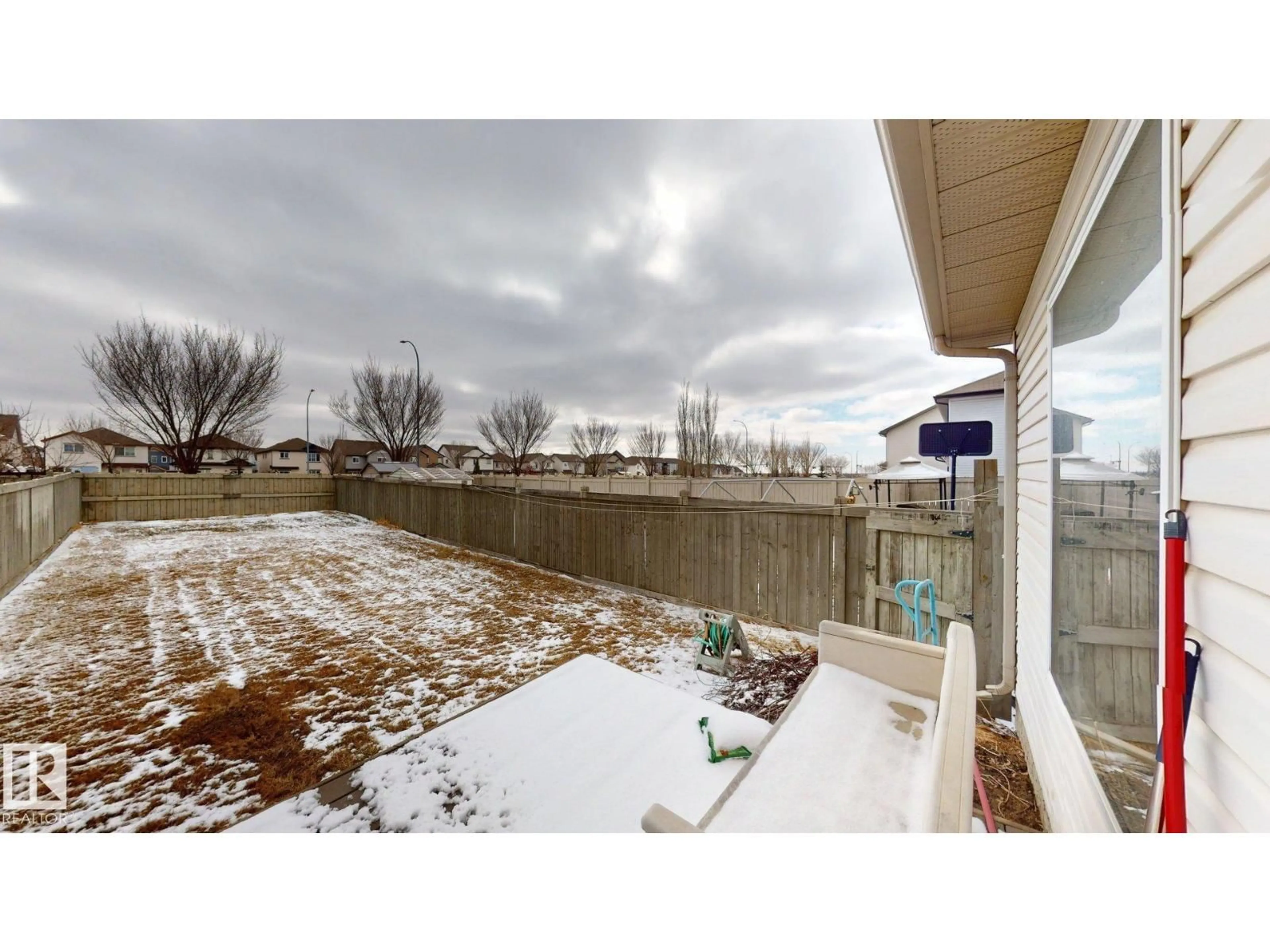 A pic from outside/outdoor area/front of a property/back of a property/a pic from drone, unknown for 5929 8 AV, Edmonton Alberta T6X0G5