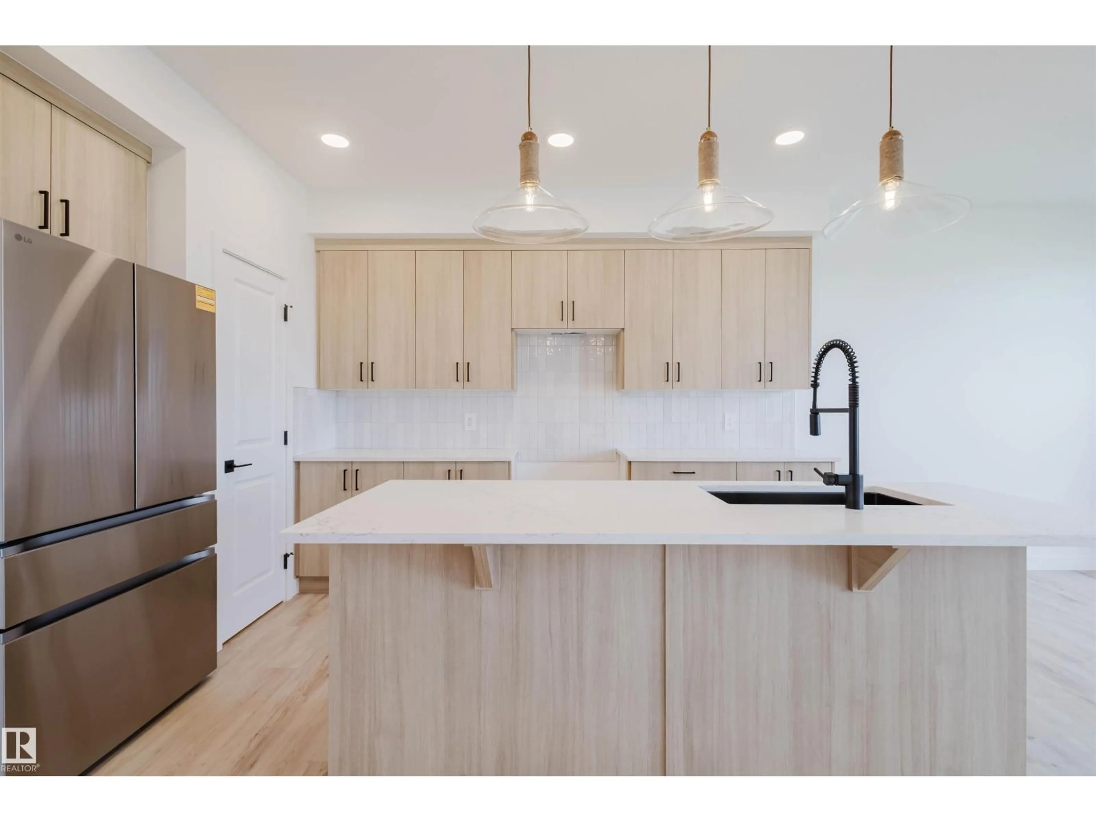 Open concept kitchen, wood/laminate floor for 42 CHARTRES CL, St. Albert Alberta T8T2E1